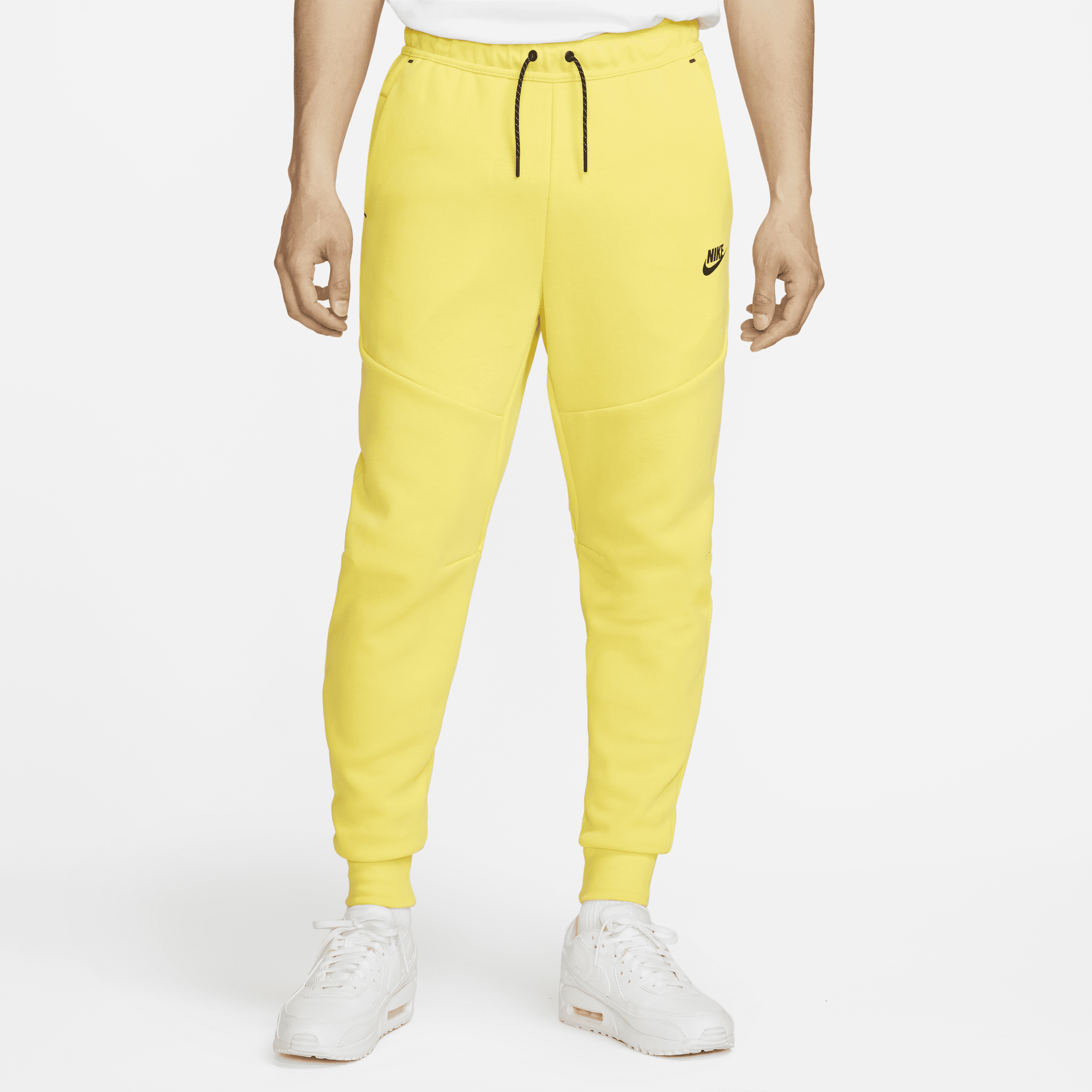 Joggery męskie Nike Sportswear Tech Fleece - Żółty