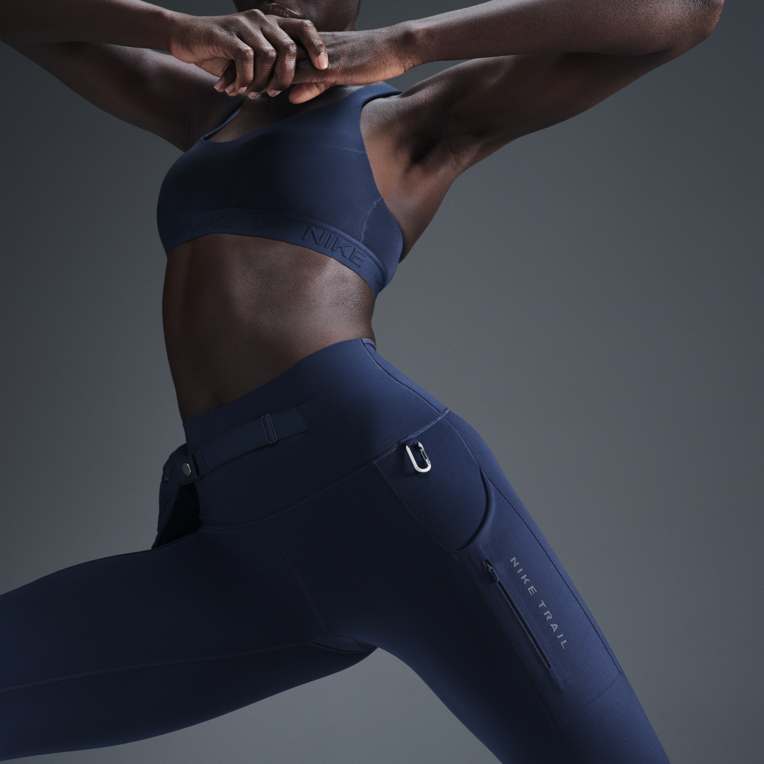 Legging 7/8 à taille haute et maintien supérieur avec poches Nike Trail Go pour femme - Bleu