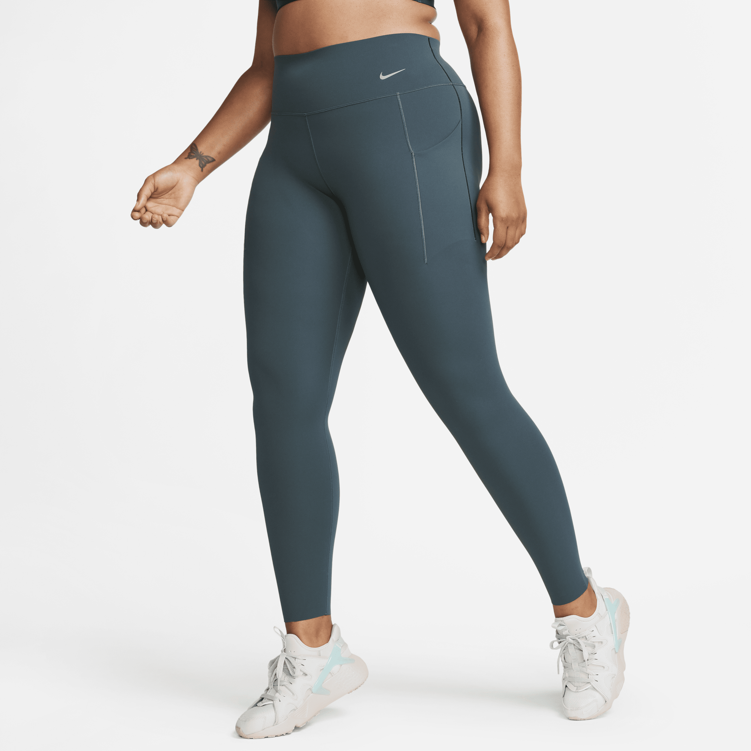 Nike Universa Legging met halfhoge taille en medium ondersteuning en zakken voor dames Groen