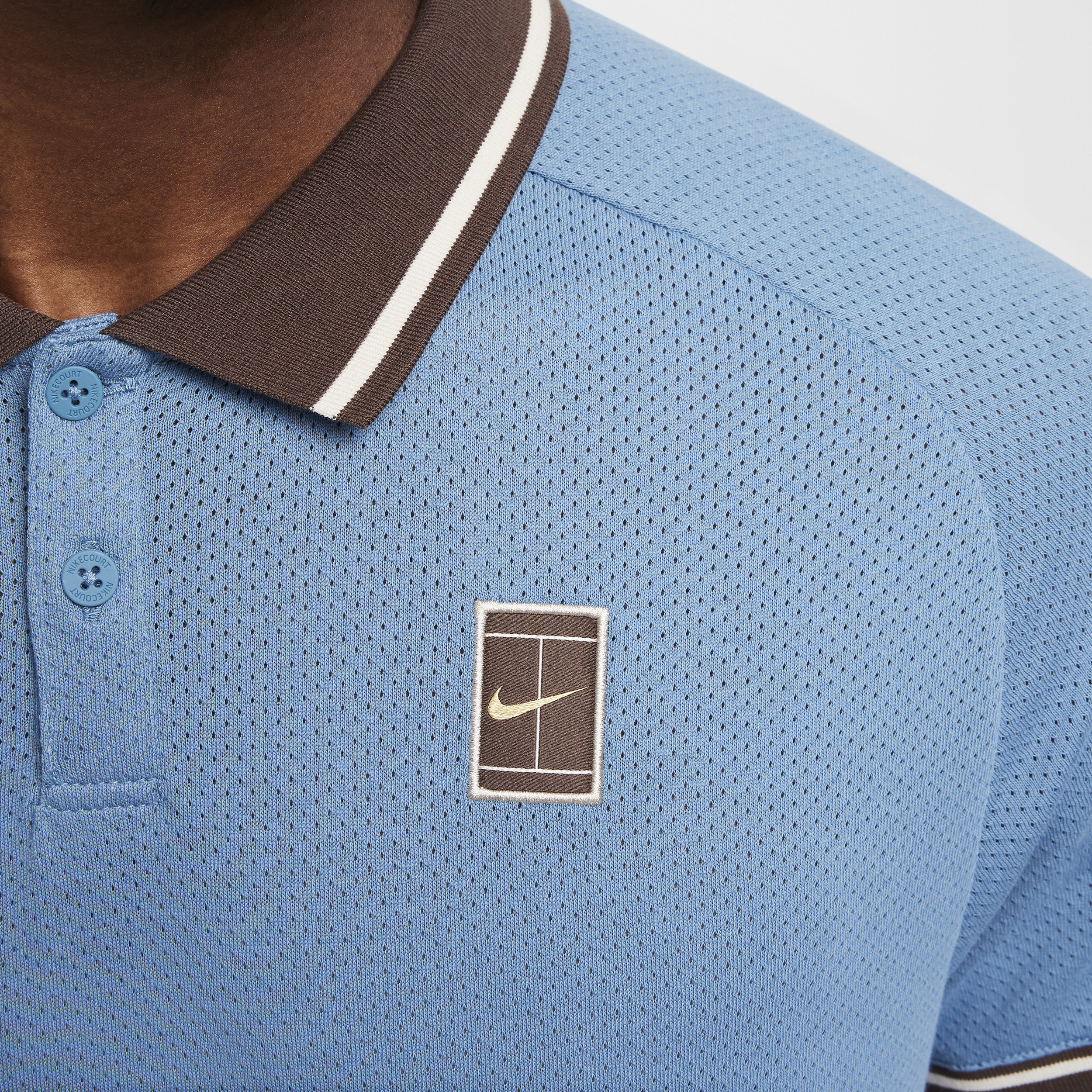 Polo de tennis NikeCourt Heritage pour Homme - Bleu