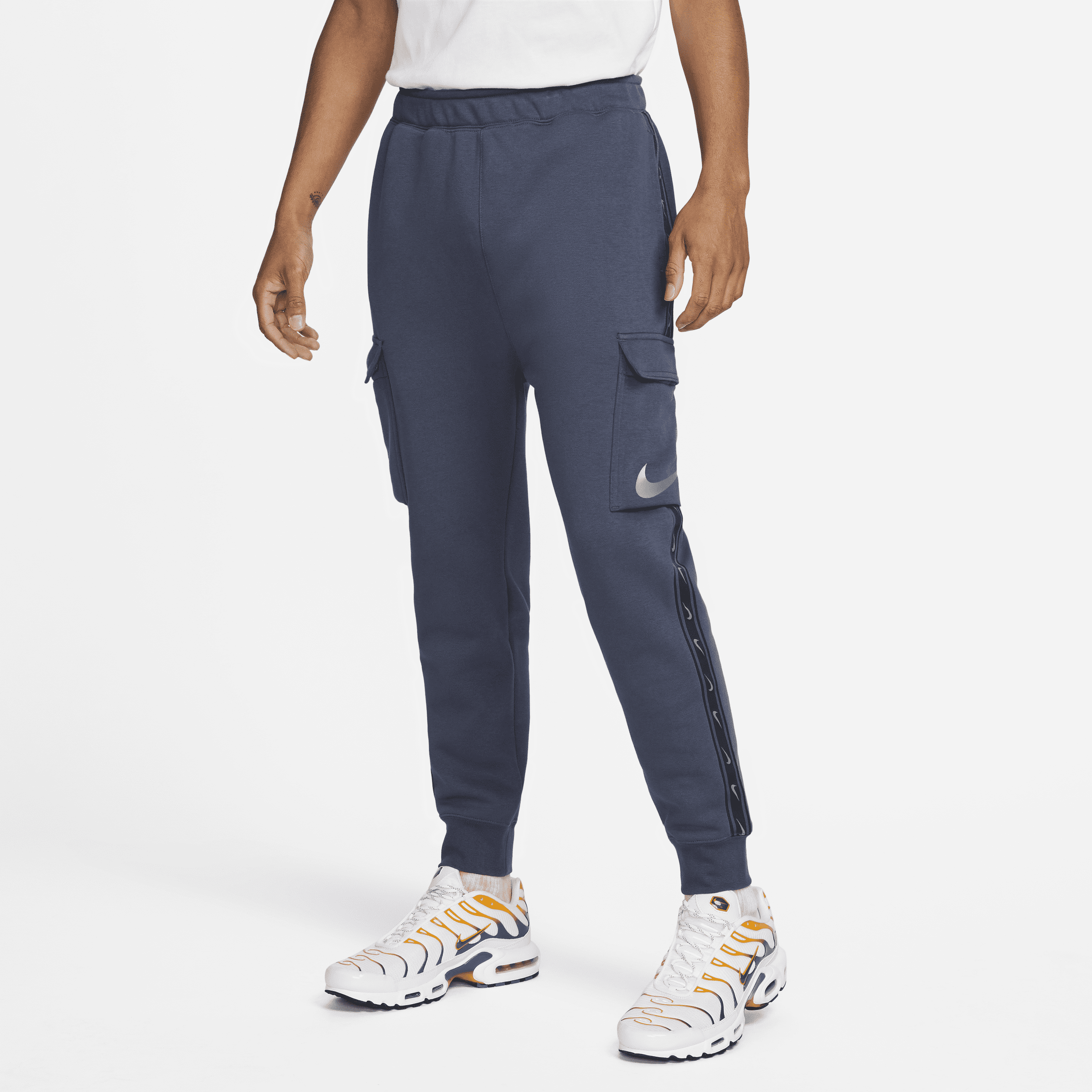 Męskie bojówki z dzianiny Nike Sportswear Repeat - Niebieski