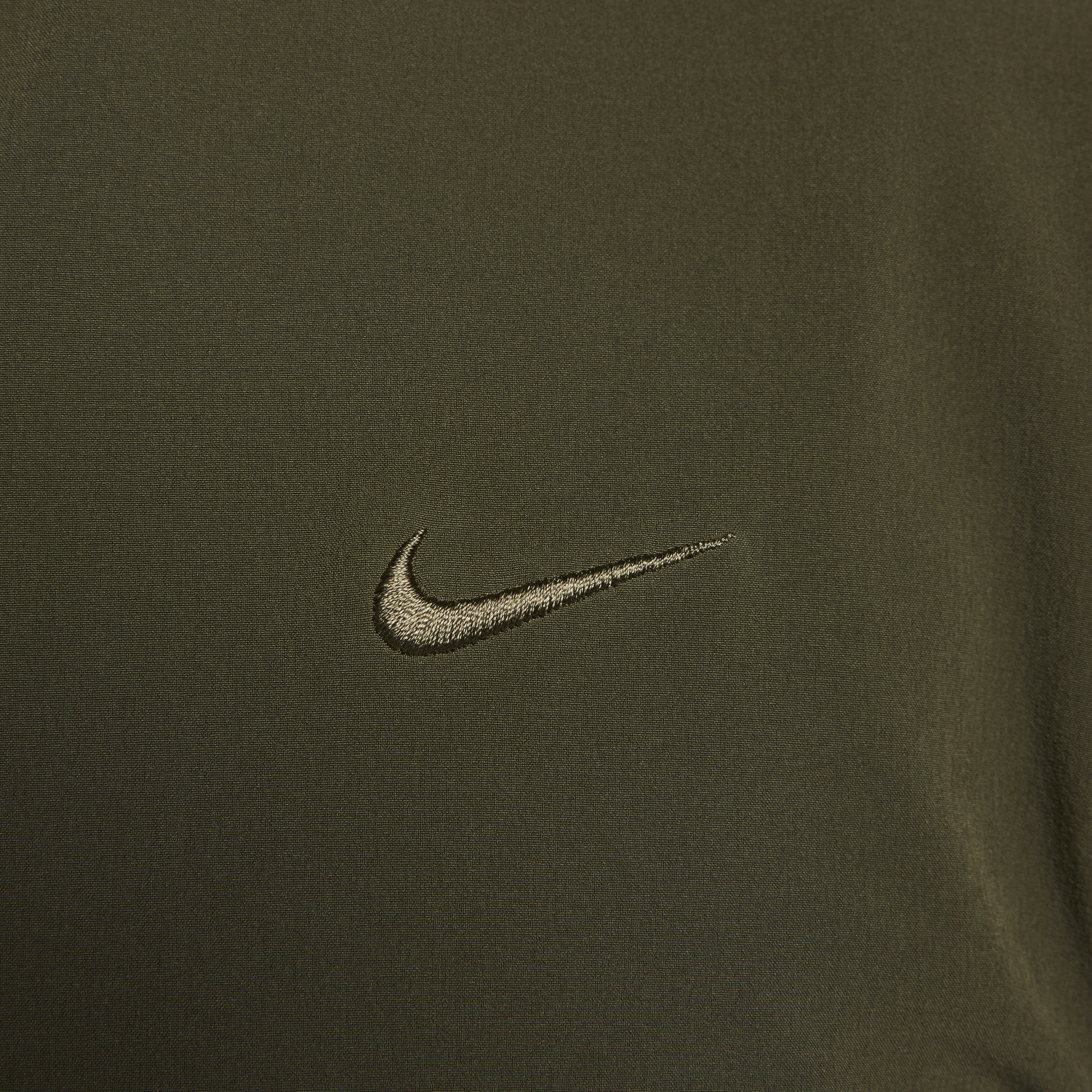 Nike Unlimited veelzijdig waterafstotend herenjack met capuchon Groen