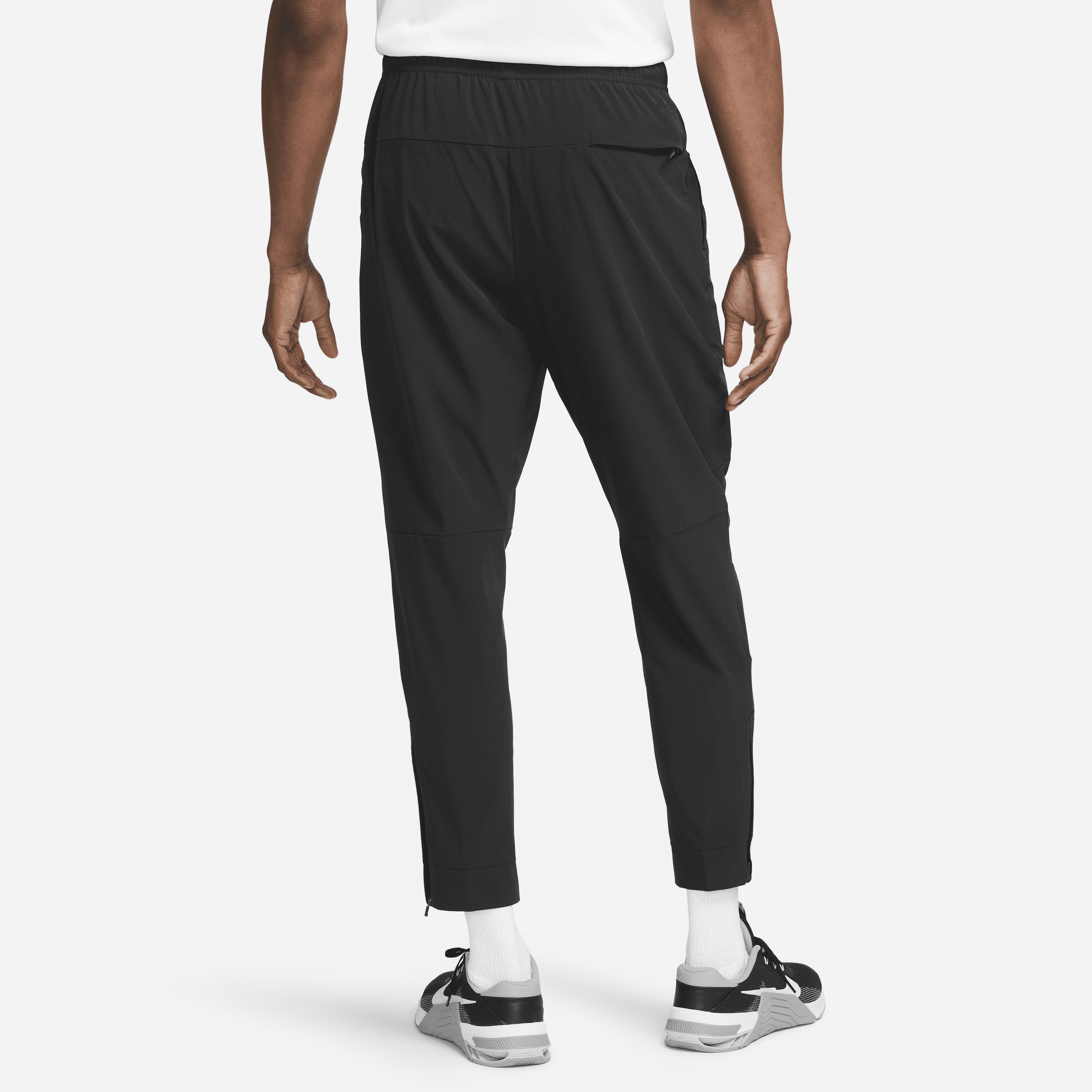 Pantalon avec ouvertures à zip Nike Dri-FIT Unlimited pour homme - Noir