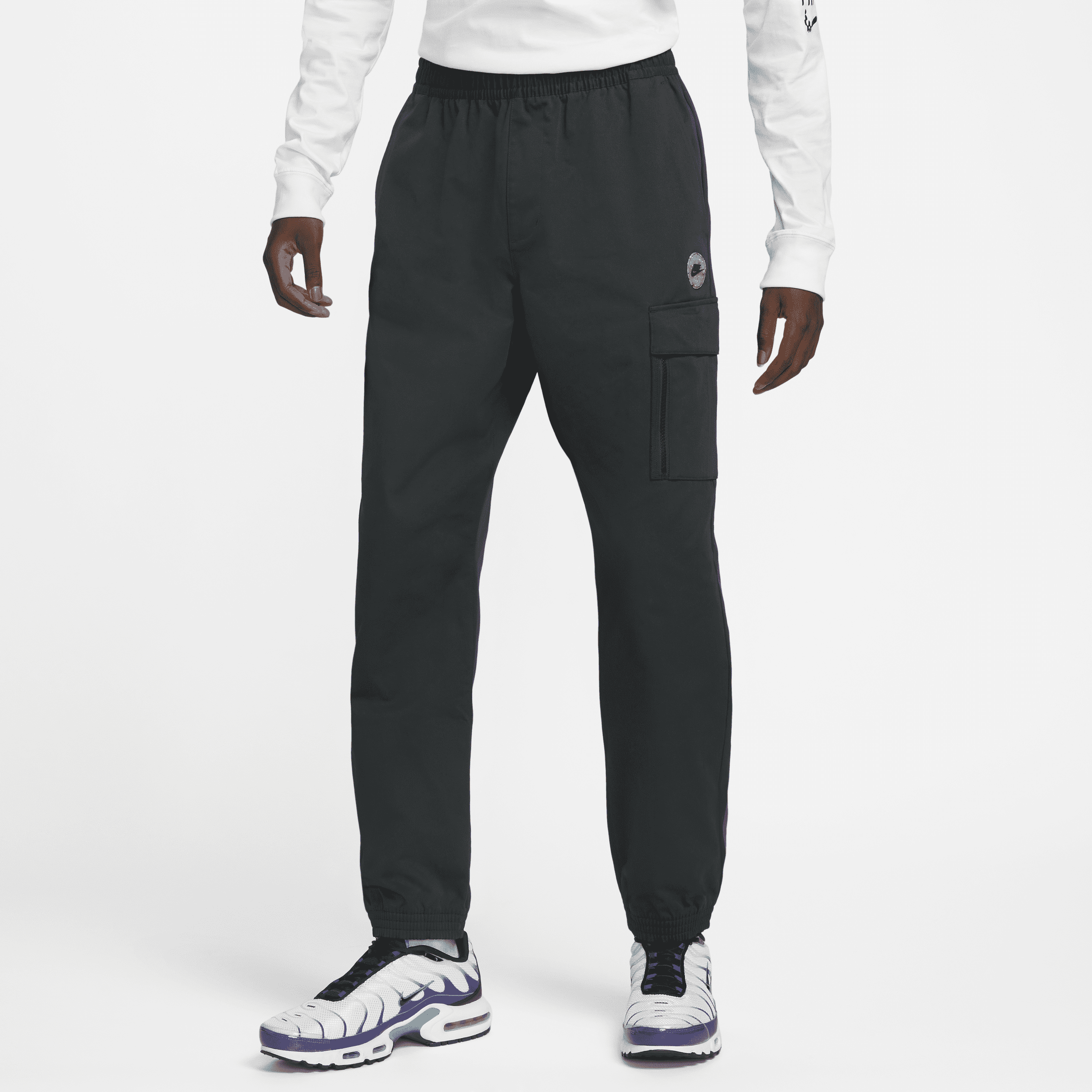 Męskie spodnie sportowe z tkaniny utility Nike Sportswear - Czerń
