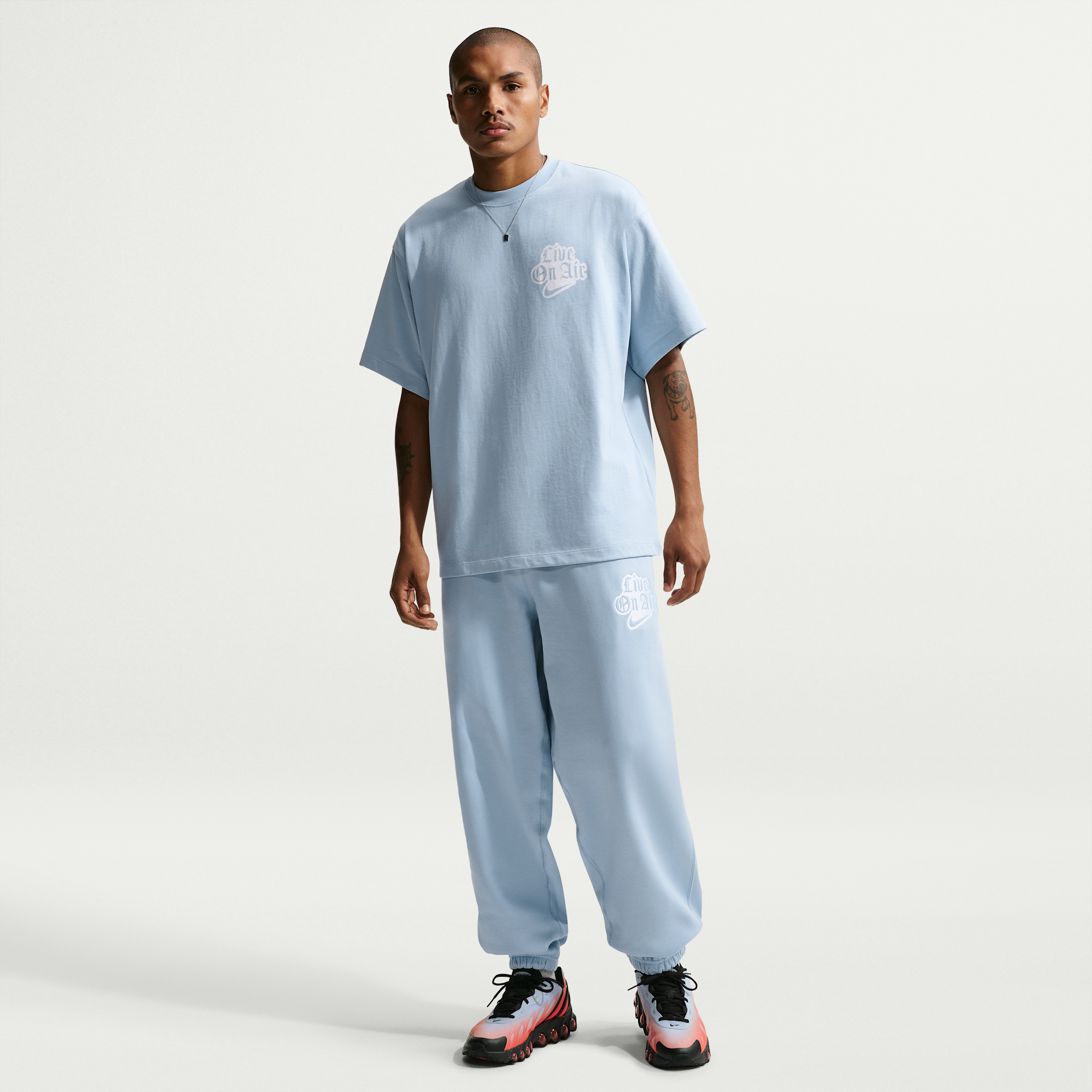 Pantaloni in fleece con risvolti Nike Solo Swoosh – Uomo - Blu