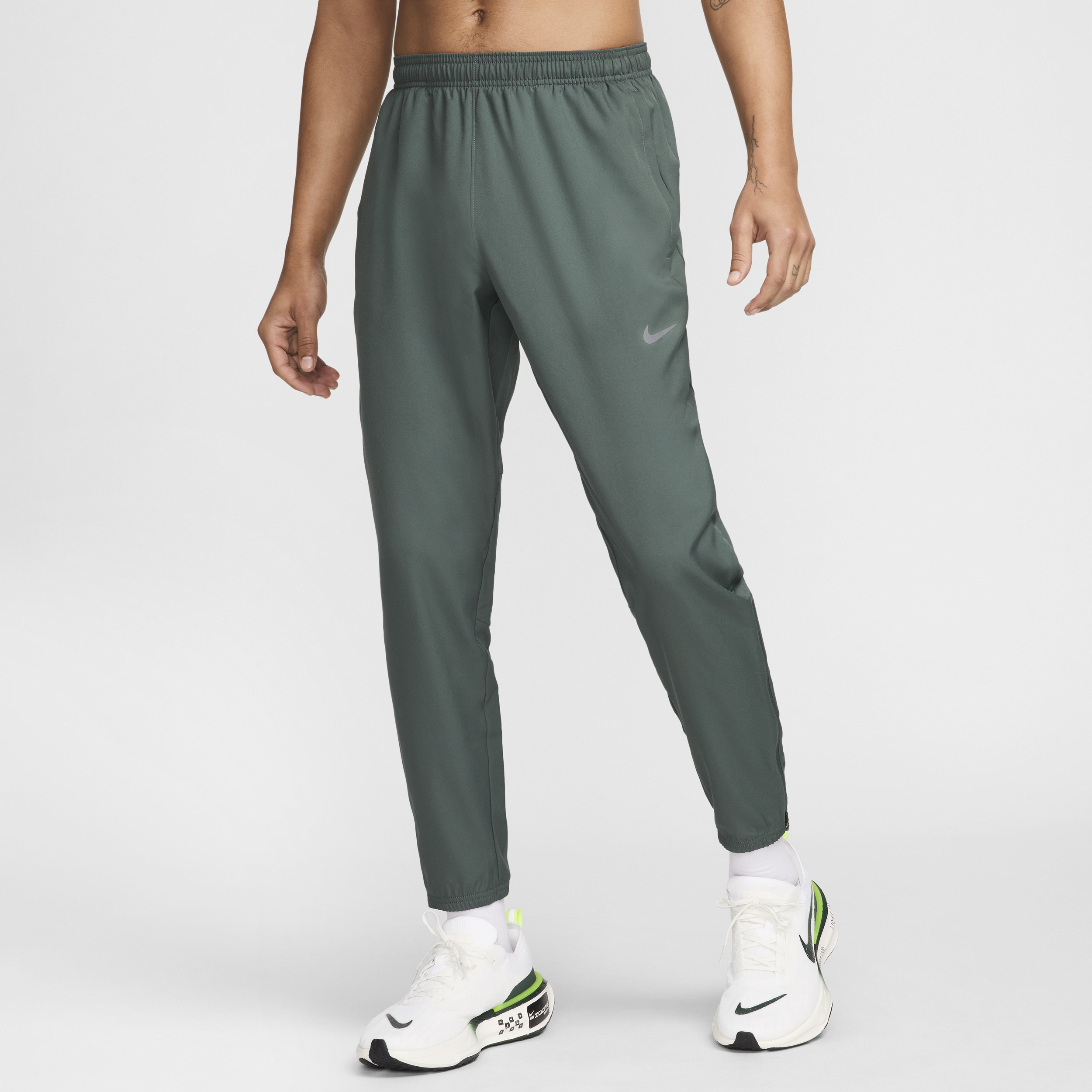 Nike Challenger Dri-FIT geweven hardloopbroek voor heren - Groen