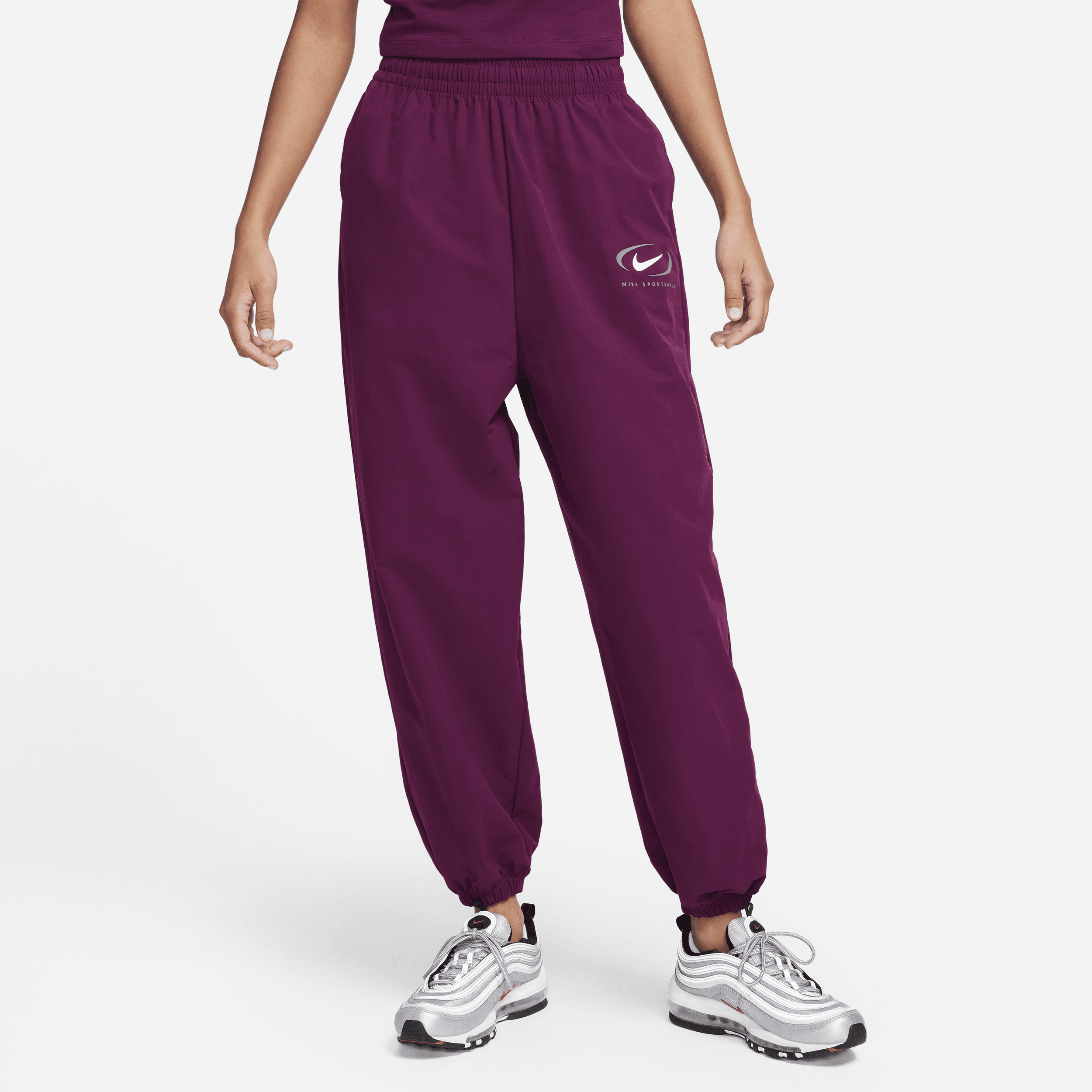 Nike Sportswear geweven joggingbroek voor dames Rood