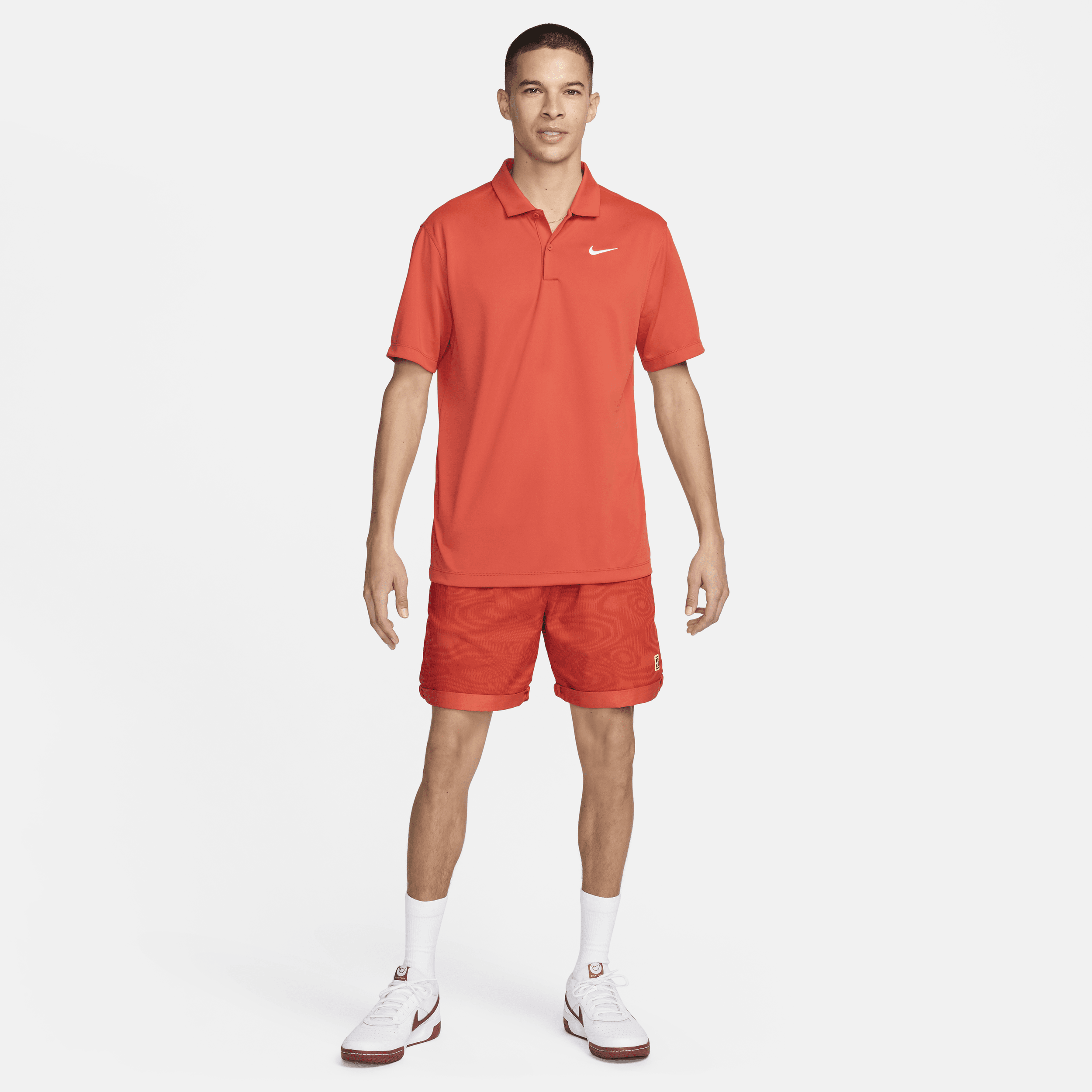 Nike Court Dri-FIT Tennispolo voor heren Oranje