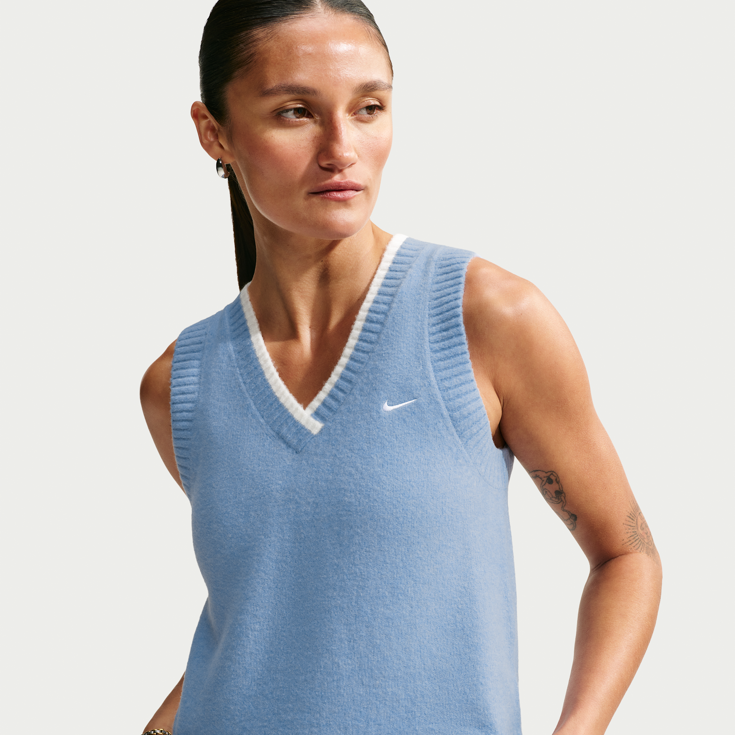 Maskinstrikket Nike Chill-sweatervest med løstsiddende pasform til kvinder - blå