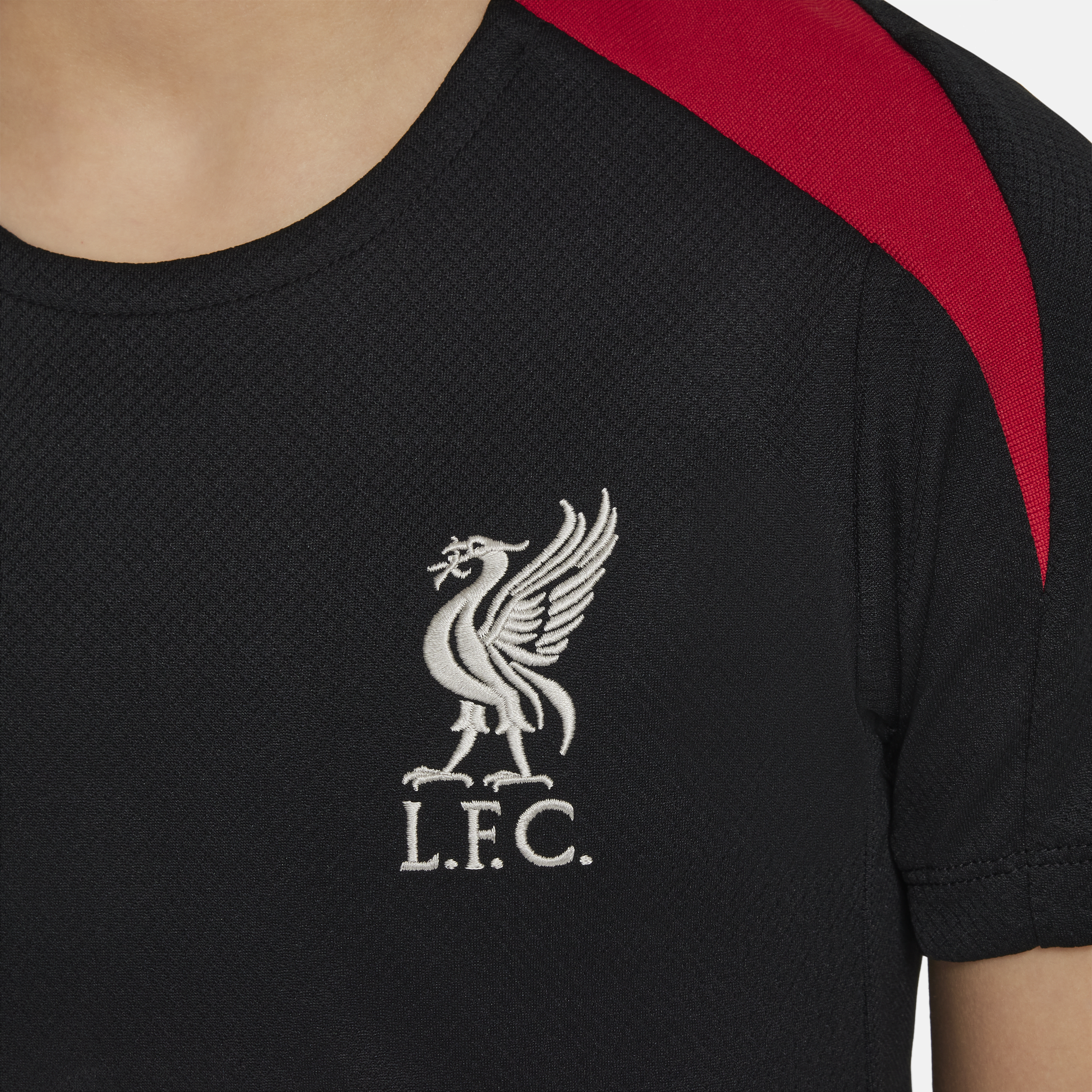 Nike Liverpool FC Strike Dri-FIT knit voetbaltop met korte mouwen voor kids Zwart