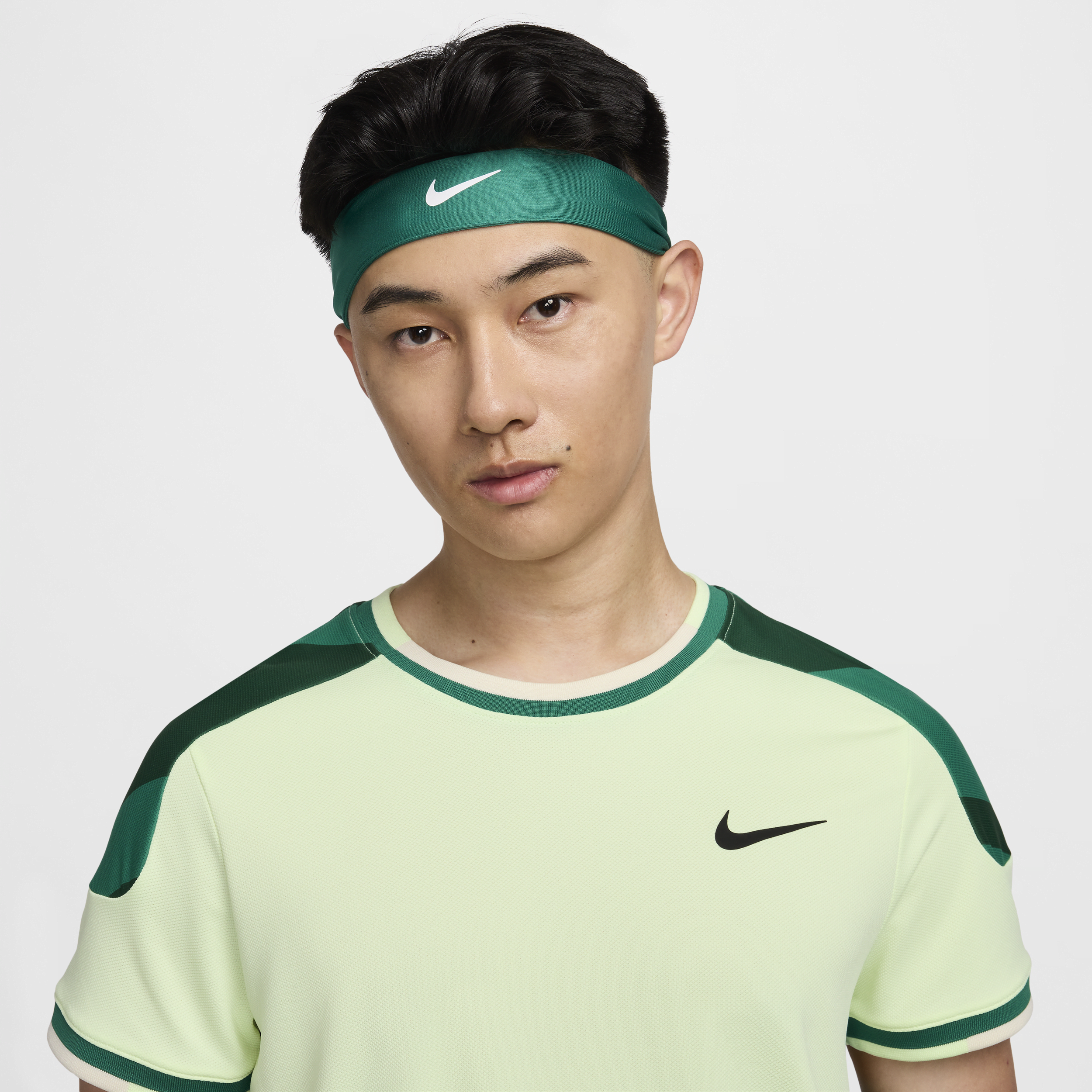 Nike Court Tennishoofdband voor Groen