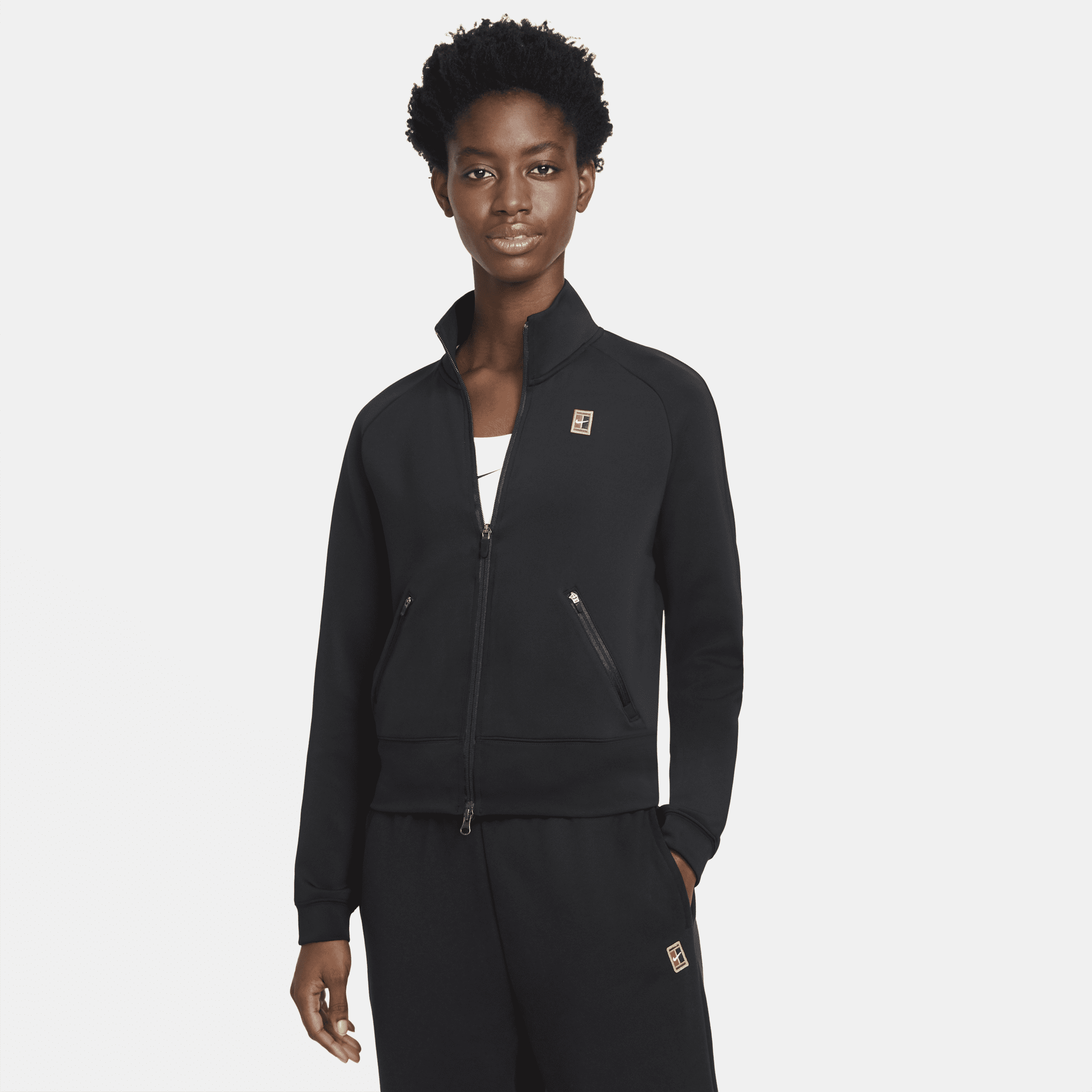 Image of NikeCourt Tennisjack met rits voor dames - Zwart