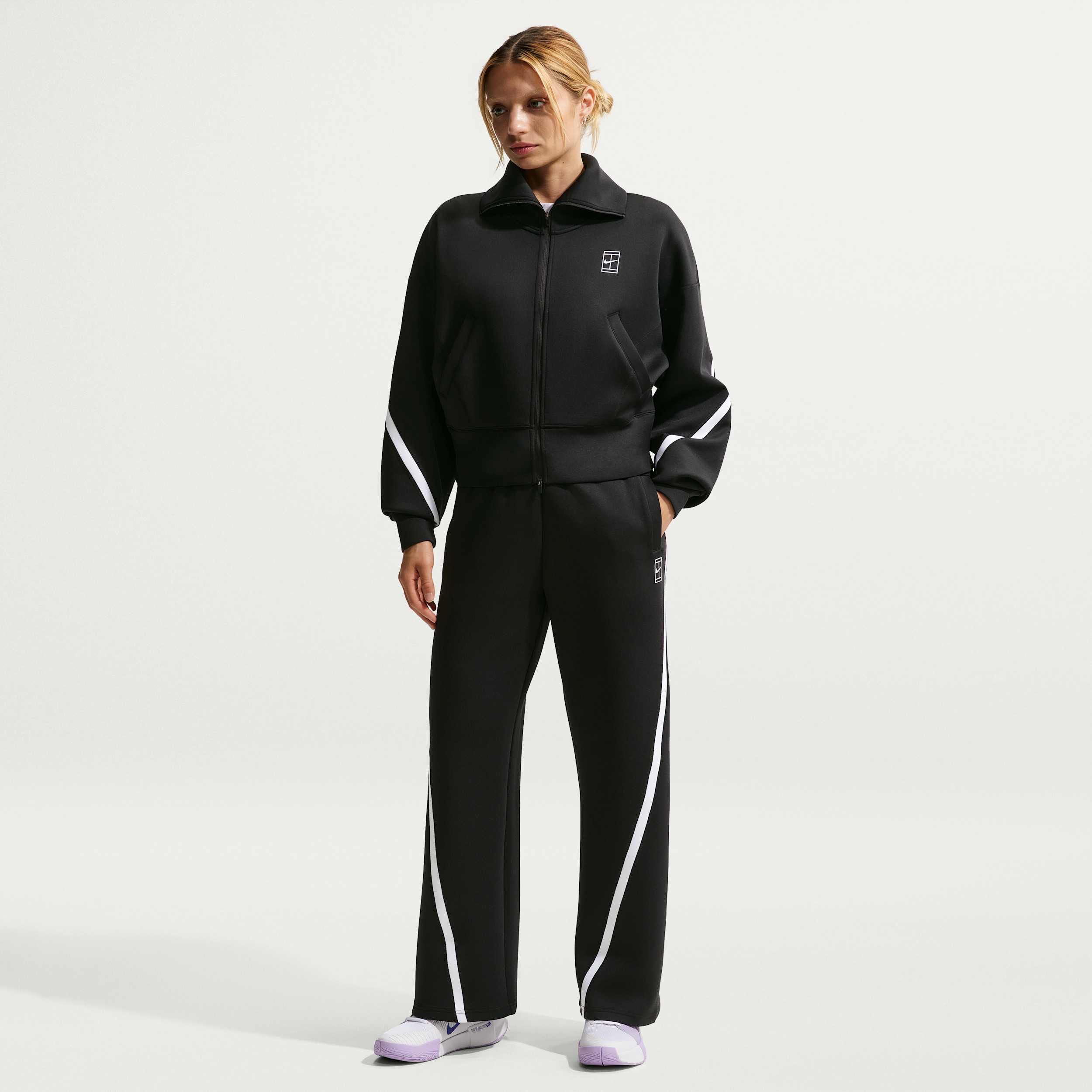 Pantaloni da tennis a vita media Dri-FIT Nike Advantage – Donna - Nero