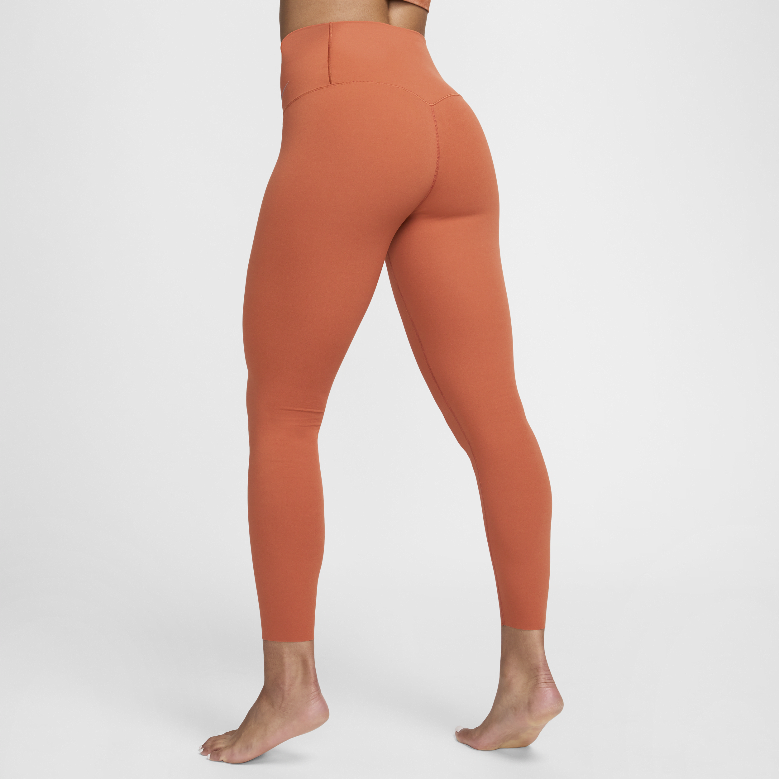 Nike Zenvy 7 8-legging met iets ondersteunende hoge taille voor dames Oranje