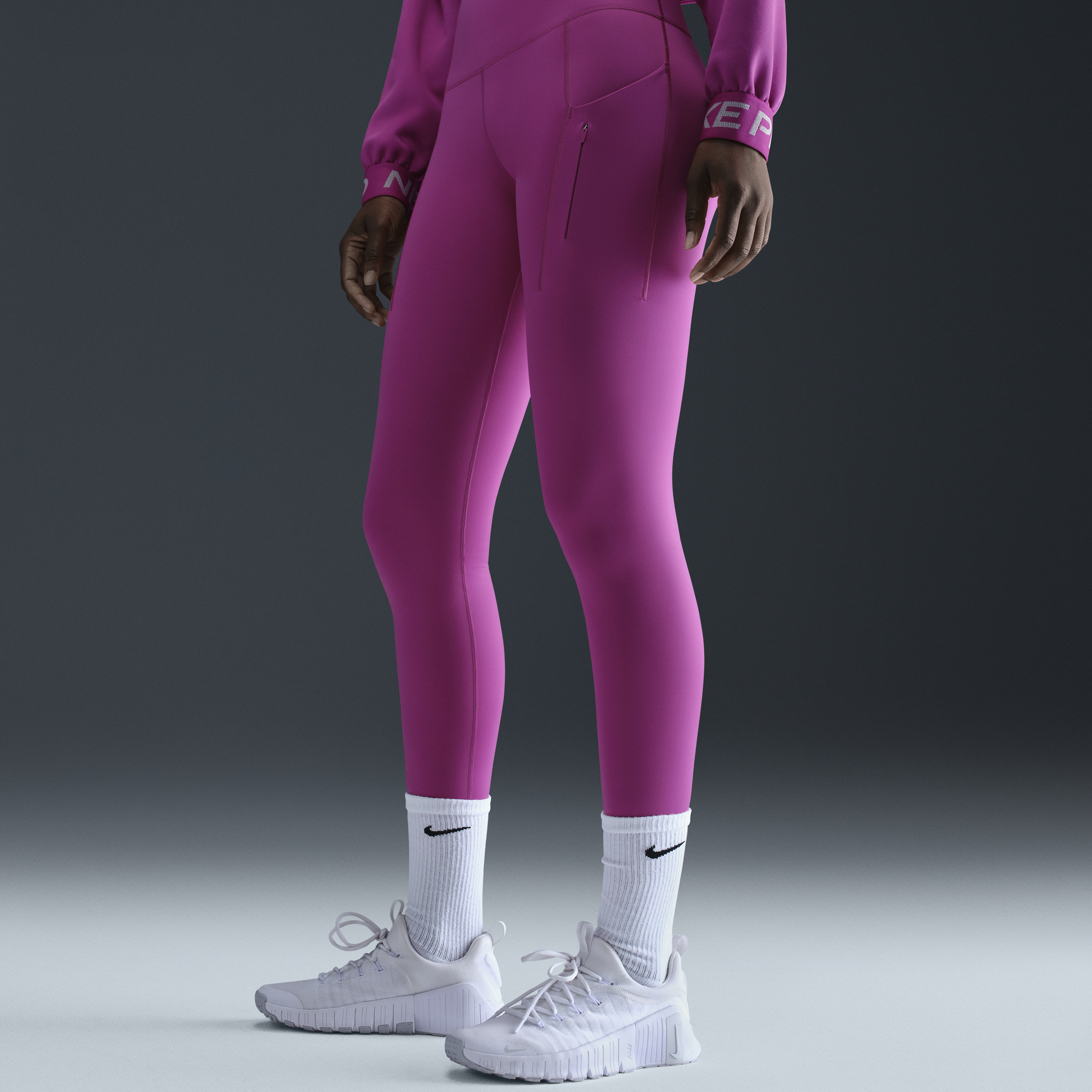 Legging taille haute à maintien supérieur et coupe longue avec poches Nike Go pour femme - Pourpre