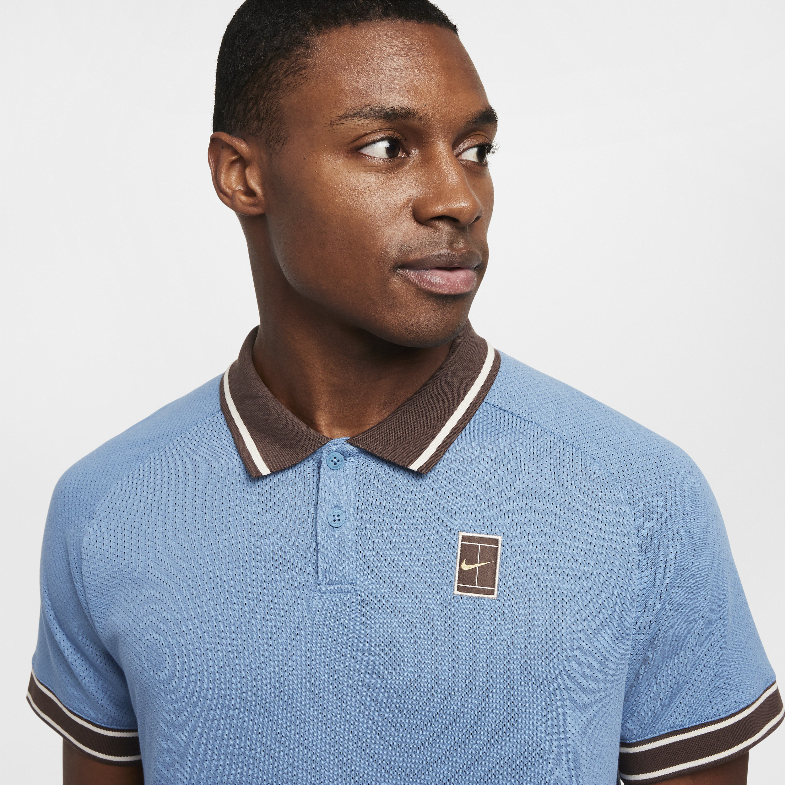 Polo de tennis NikeCourt Heritage pour Homme - Bleu