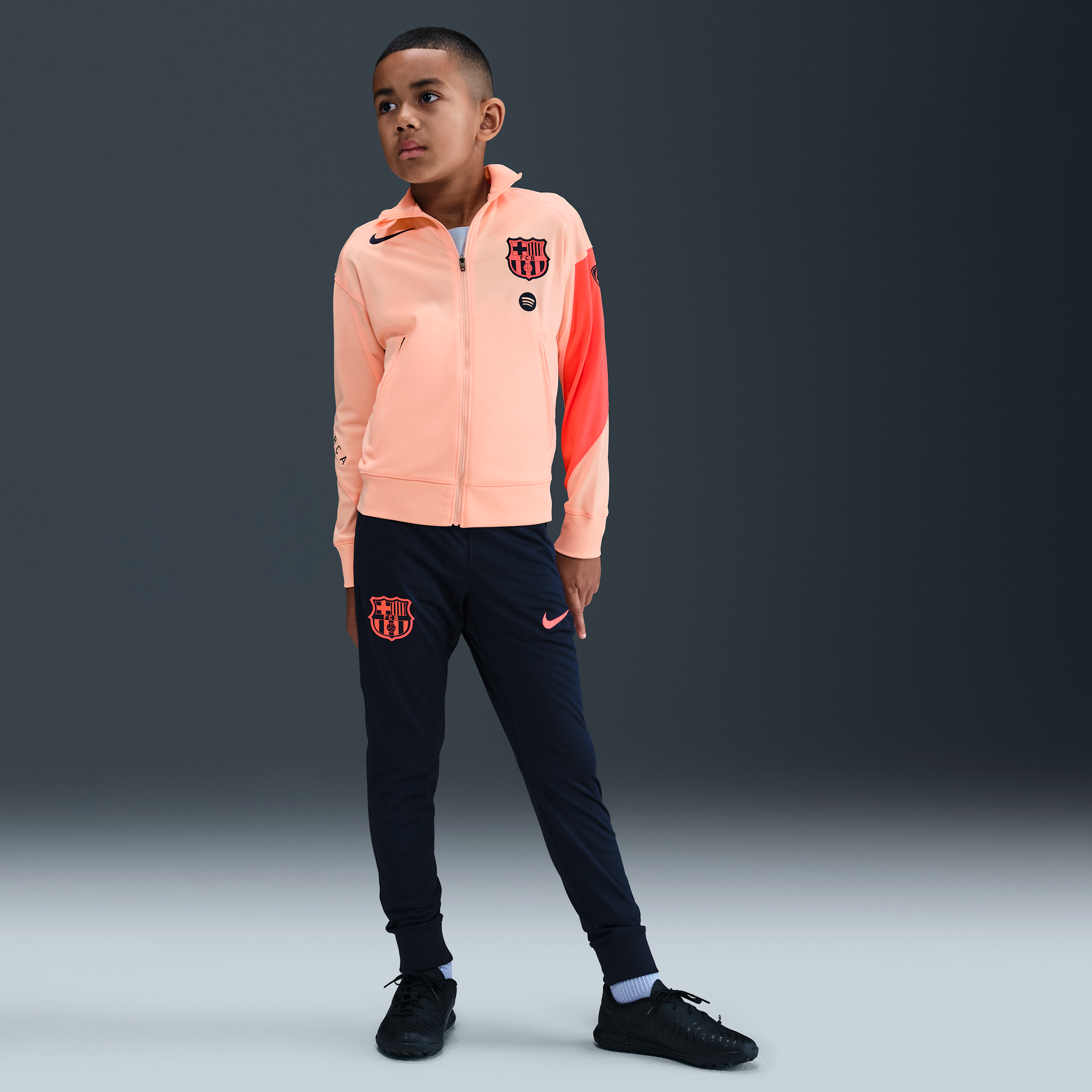 Nike FC Barcelona Strike Derde  Total 90 knit voetbaltrainingspak met Dri-FIT voor kids - Oranje