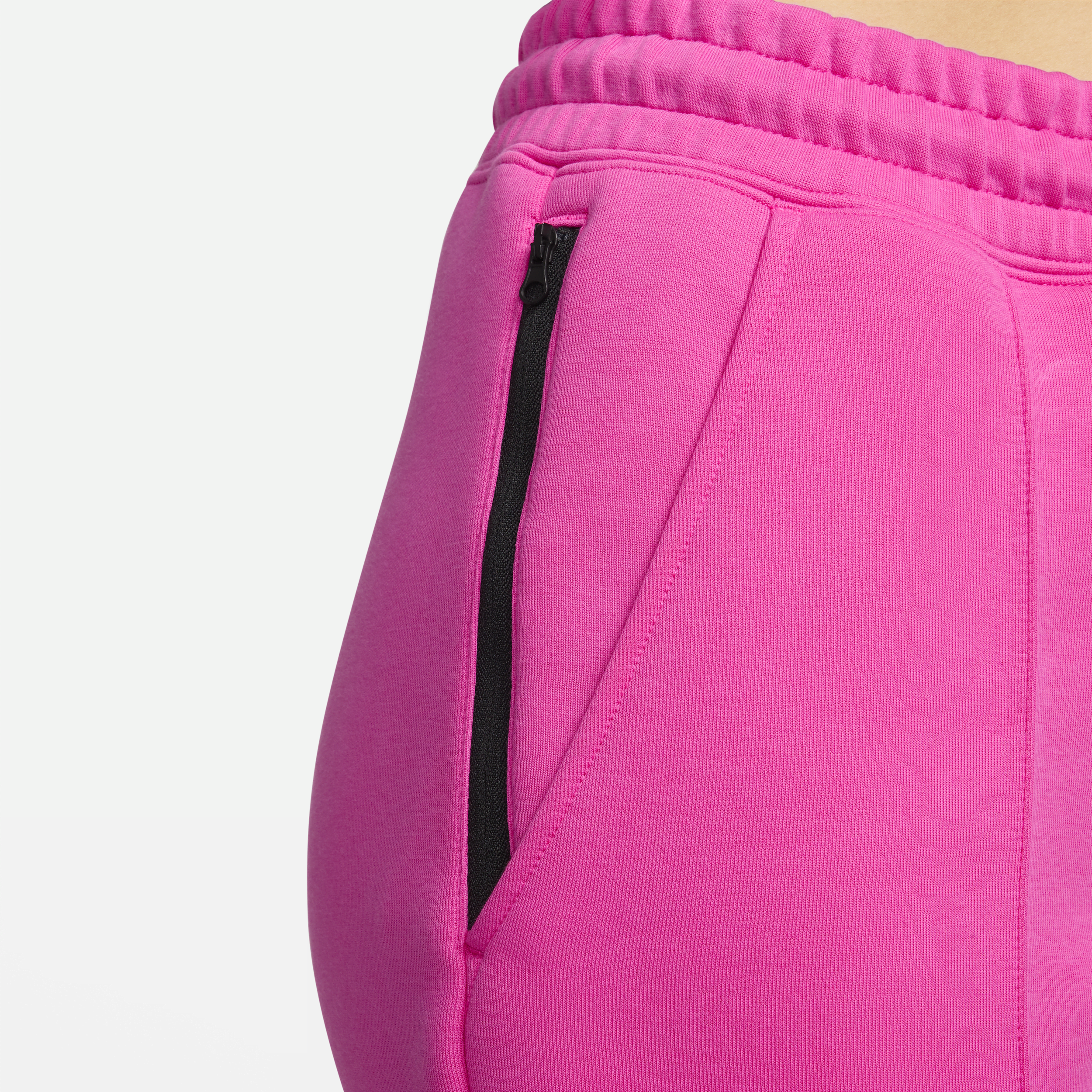 Nike Sportswear Tech Fleece Joggingbroek met halfhoge taille voor dames Rood