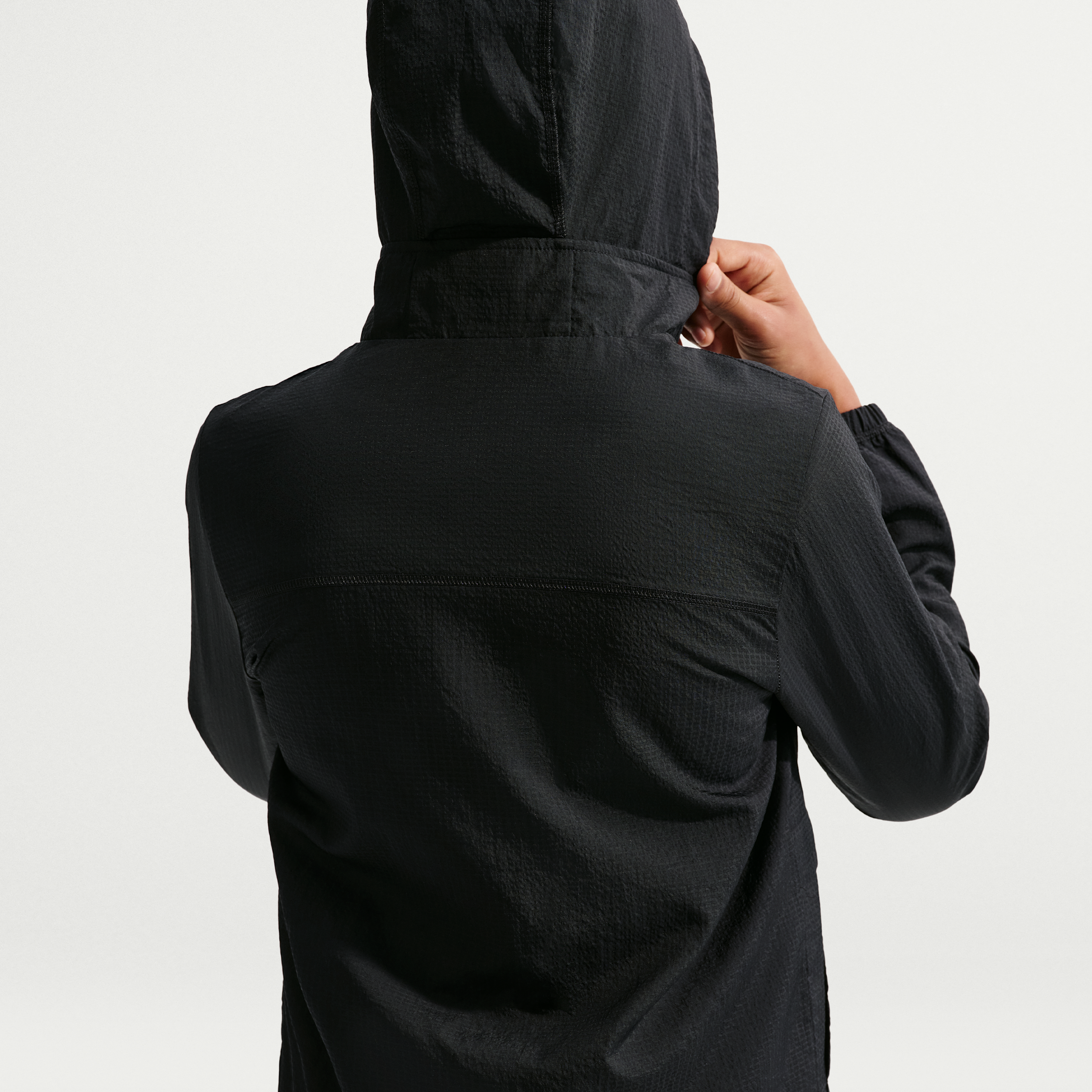 Thumbnail - Nike City Utility gewebte Jacke mit durchgehendem Reißverschluss (ältere Kinder) - Schwarz