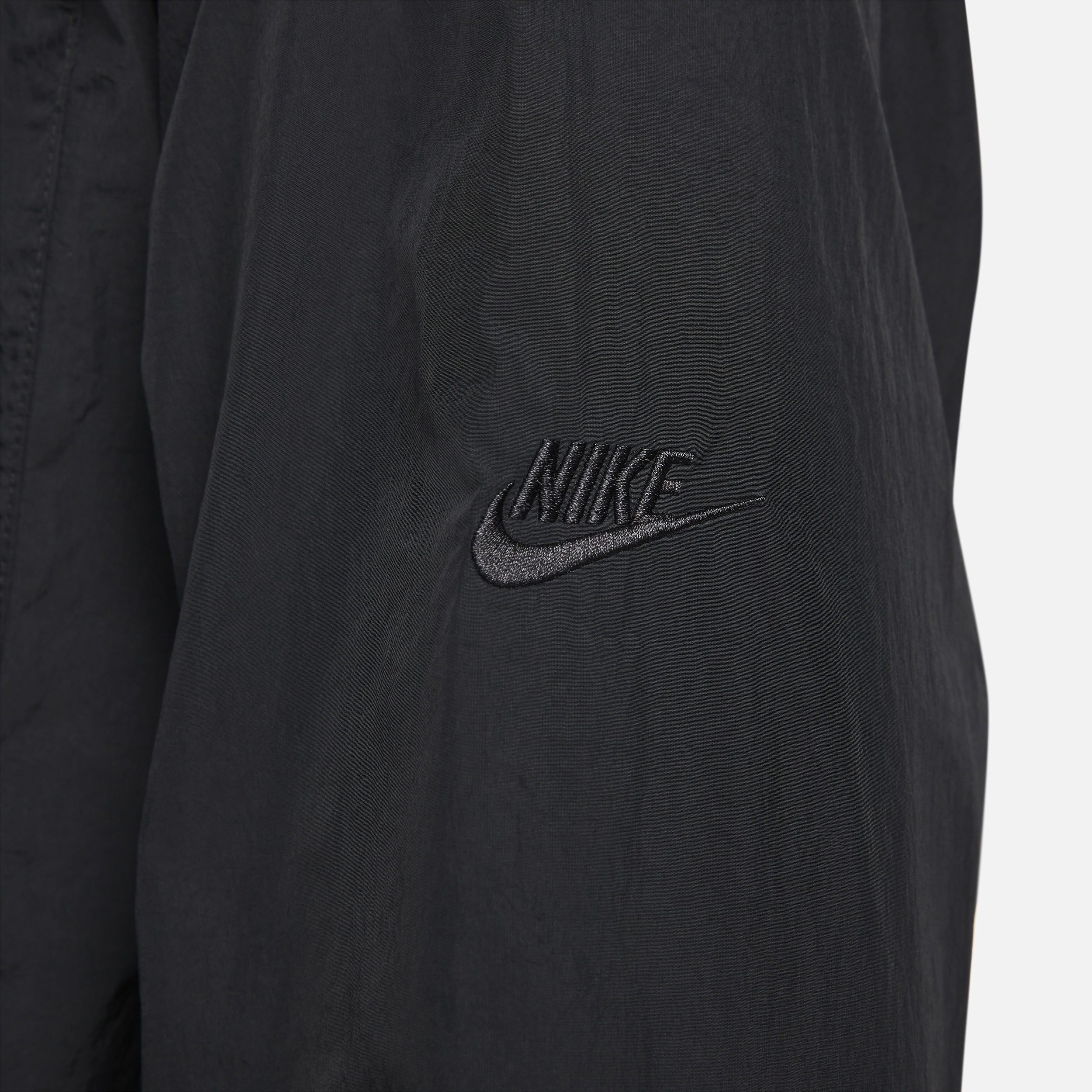 Nike Sportswear Tech Pack geweven herenshirt met lange mouwen Zwart