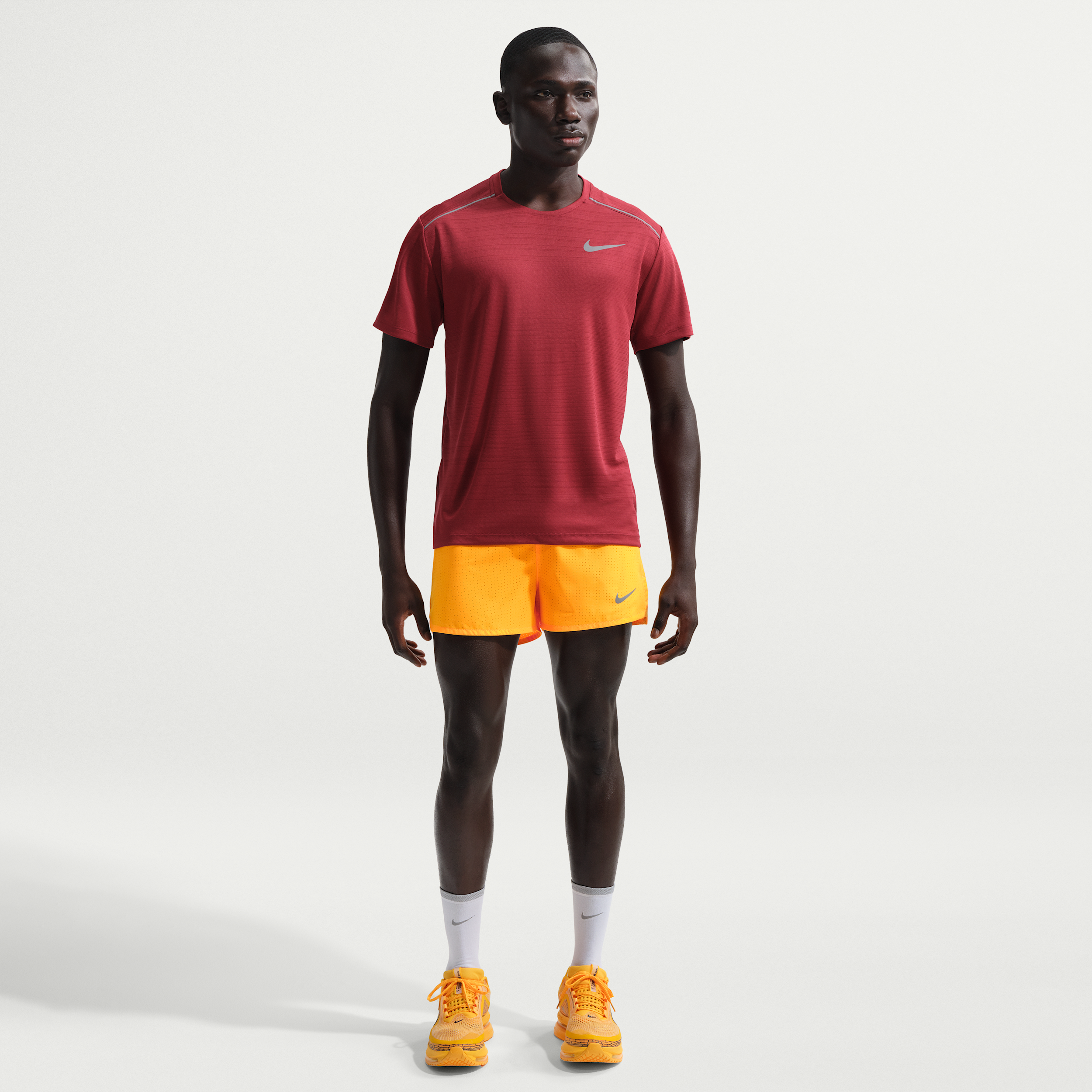Short de running avec sous-short intégré 8 cm Dri-FIT Nike Fast pour homme - Orange