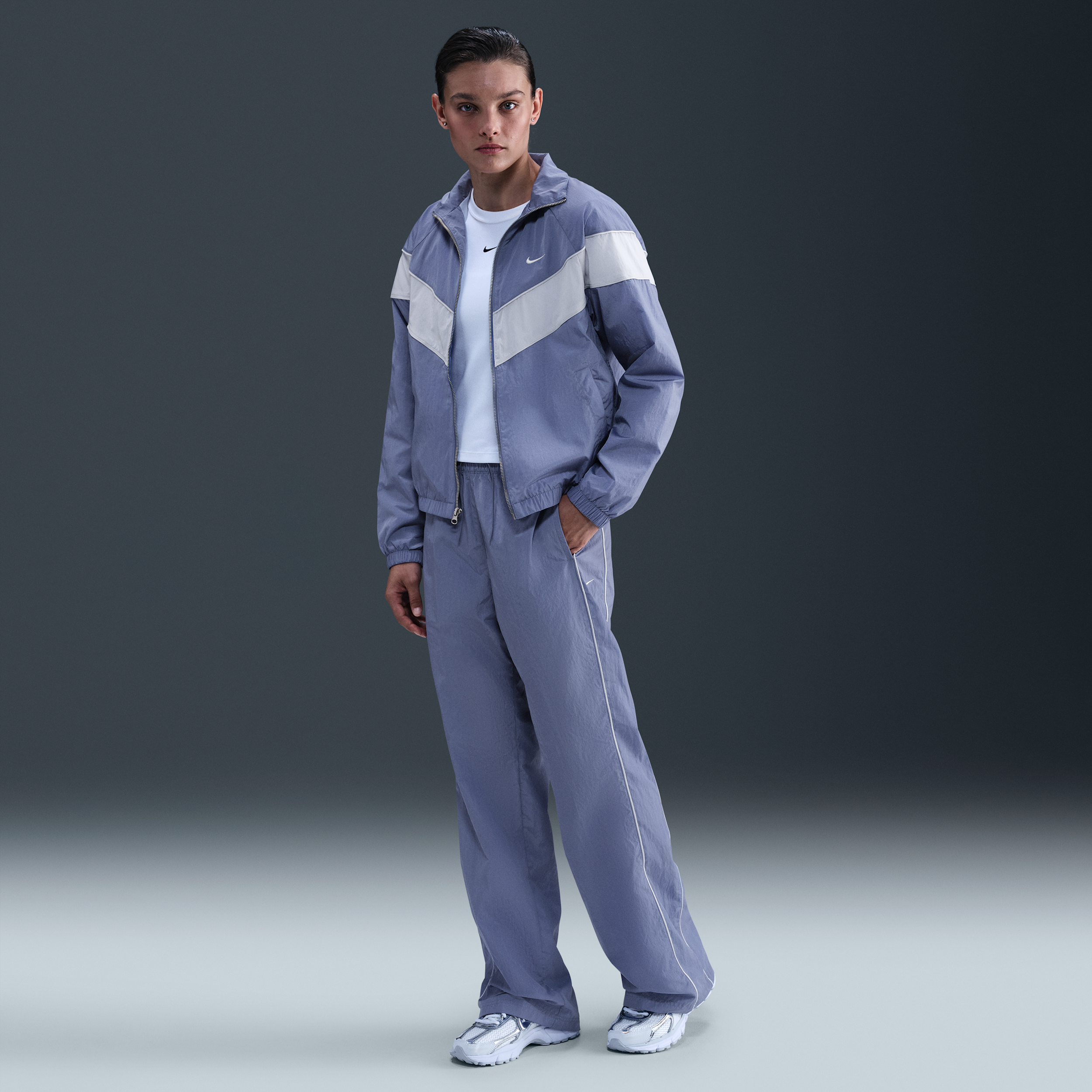 Nike Windrunner geweven damesbroek met hoge taille en open zomen - Blauw
