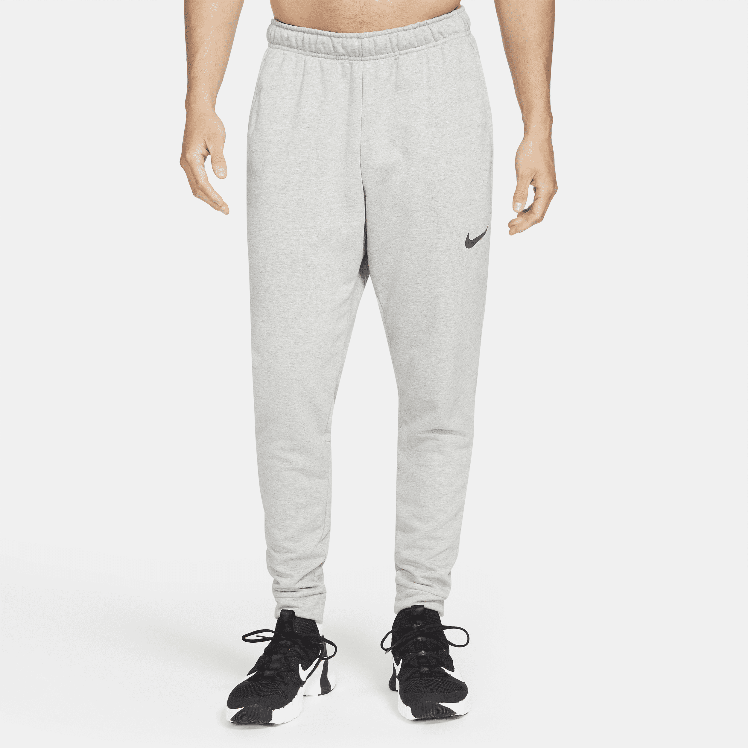 Image of Nike Dry Dri-FIT toelopende fitnessbroek van fleece voor heren - Grijs