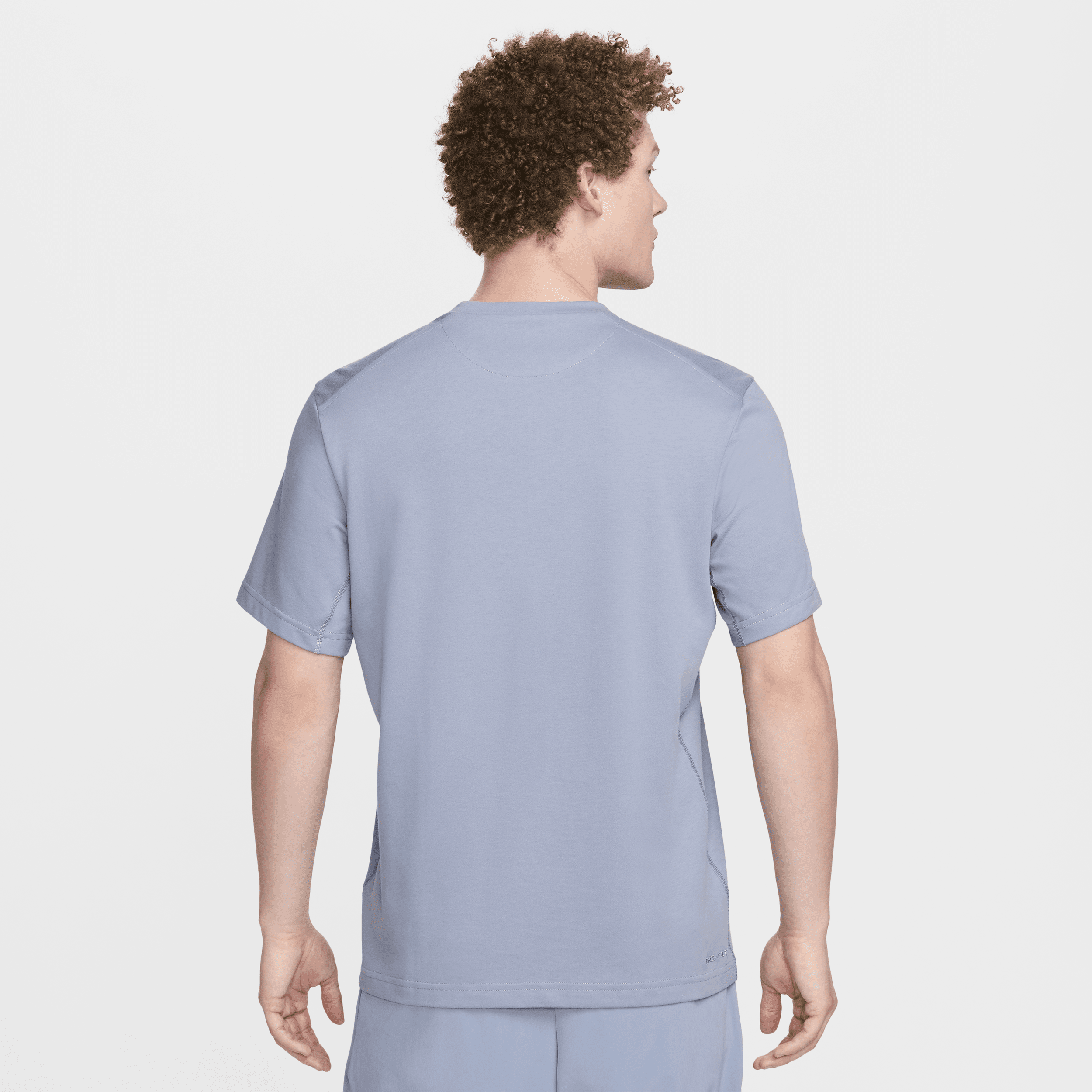 Haut à manches courtes Dri-FIT Nike Primary pour homme - Bleu