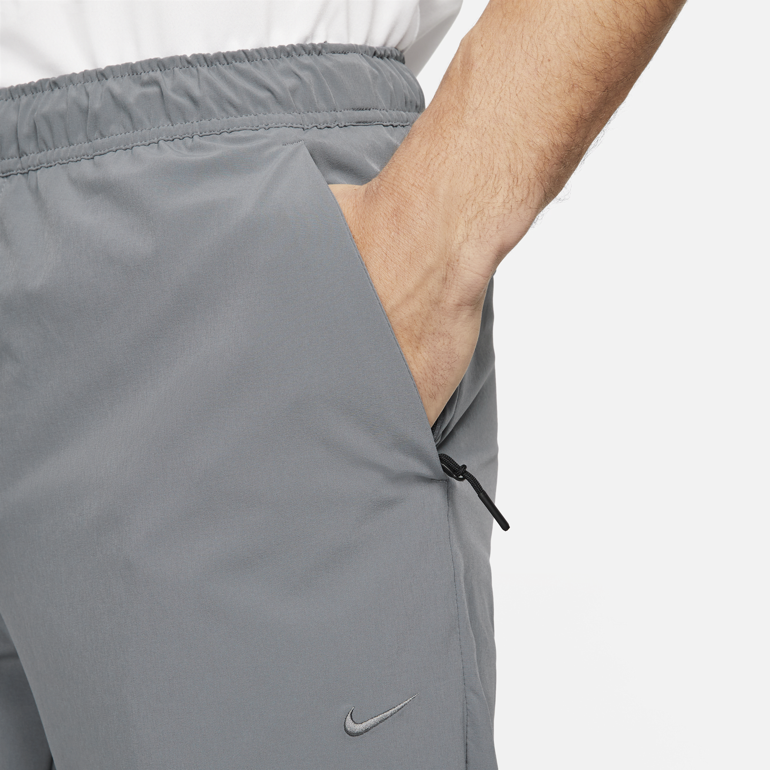 Pantalon avec ouvertures à zip Nike Dri-FIT Unlimited pour homme - Gris