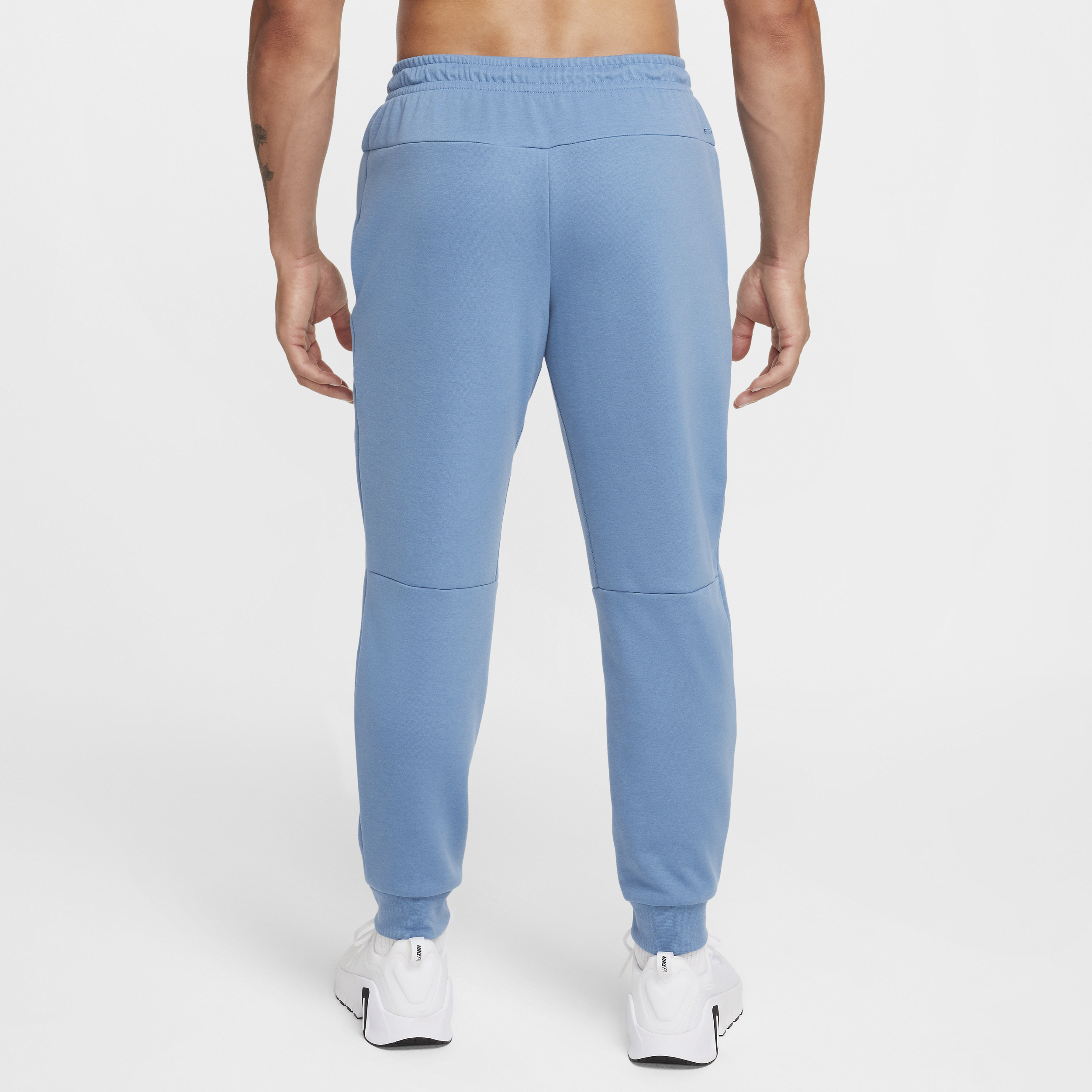 Pantalon de jogging haute performance Dri-FIT UV Nike Primary Fleece pour homme - Bleu