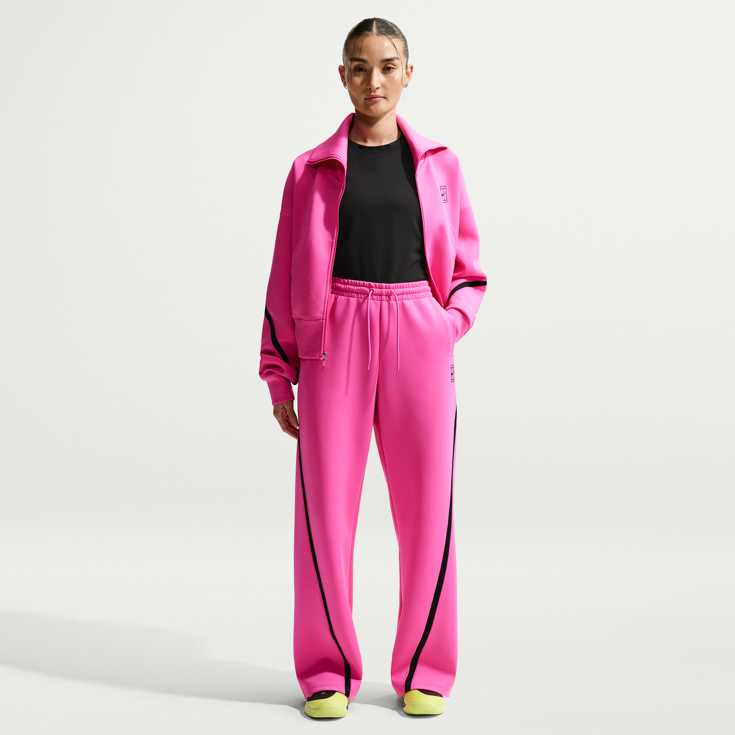 Pantaloni da tennis a vita media Dri-FIT Nike Advantage – Donna - Rosa