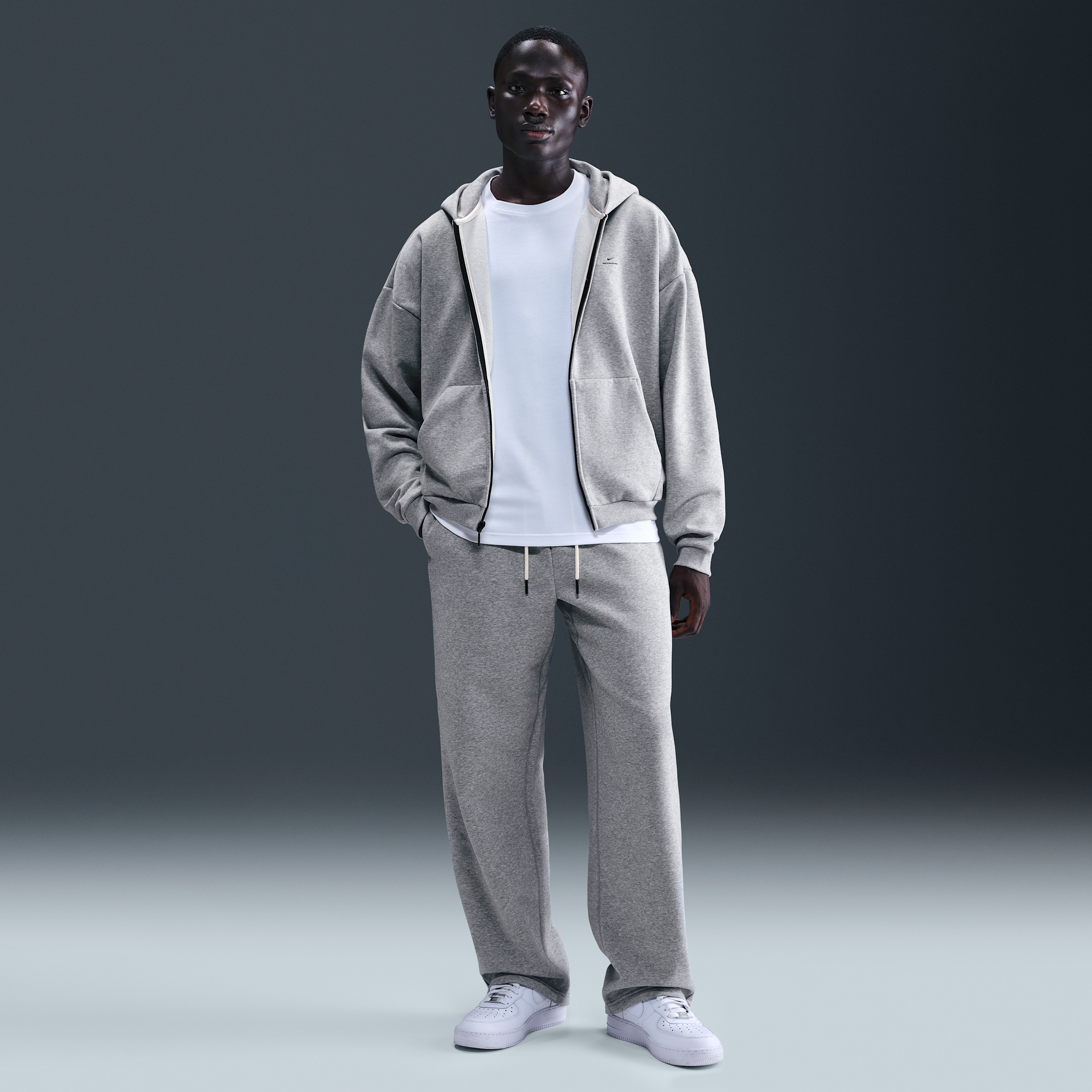 Thumbnail - Nike Standard Issue angeraute Therma-FIT-Basketballhose mit offenem Saum (Herren) - Grau