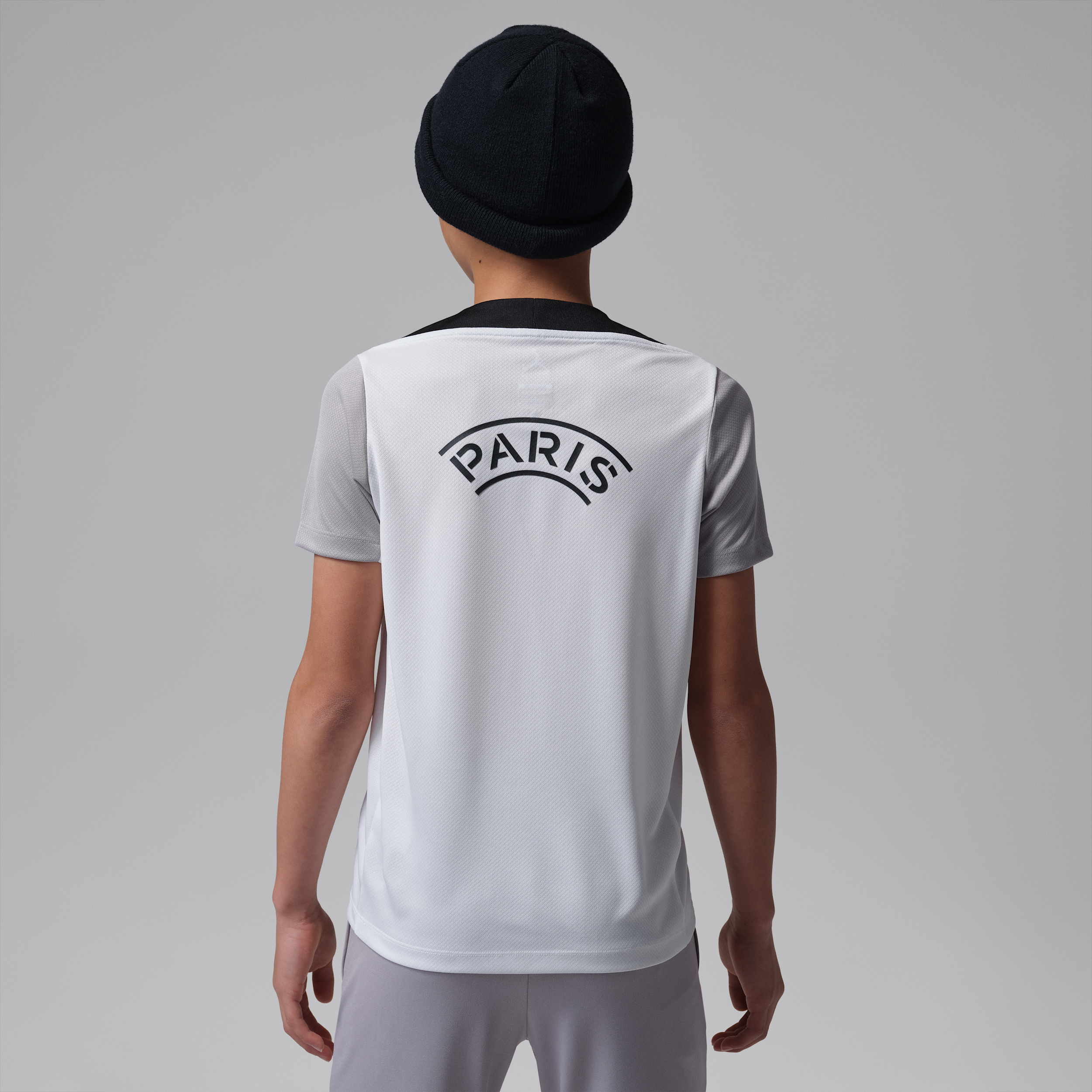 Thumbnail - Paris Saint-Germain Strike Night Edition Jordan Dri-FIT Kurzarm-Fußballoberteil aus Strickmaterial für ältere Kinder - W...