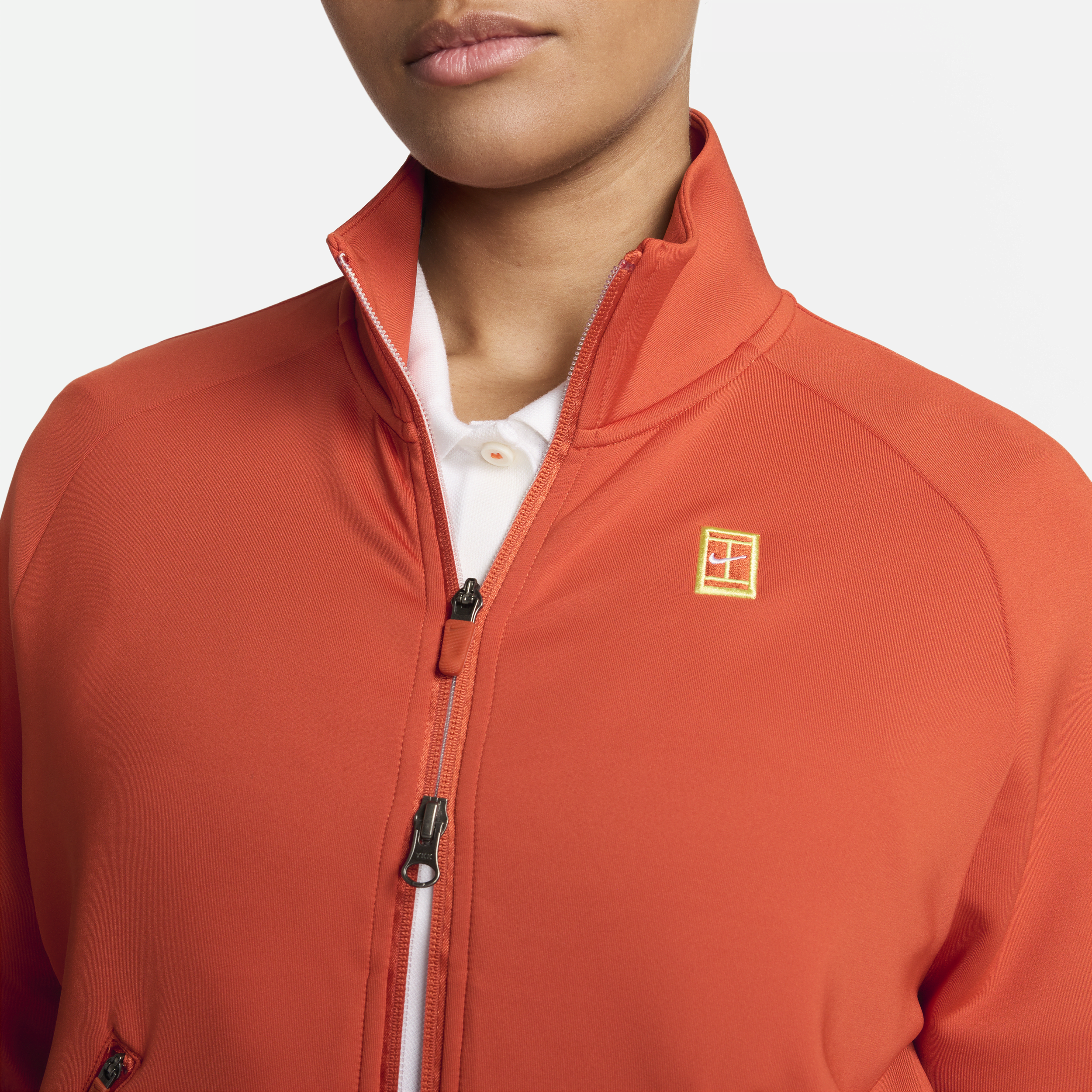 Nike Court Tennisjack met rits voor dames Oranje