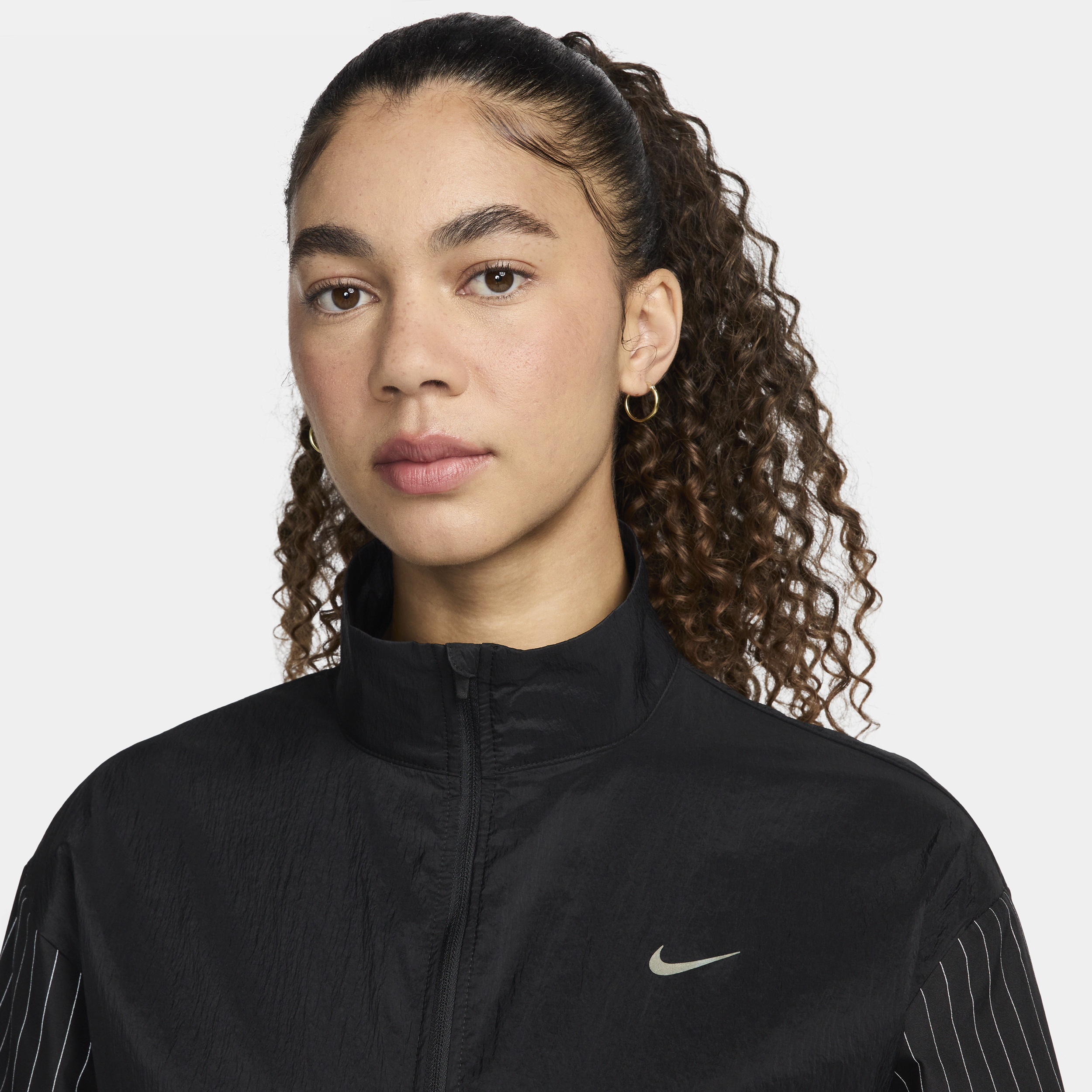 Nike Running Division hardloopjack voor dames Zwart
