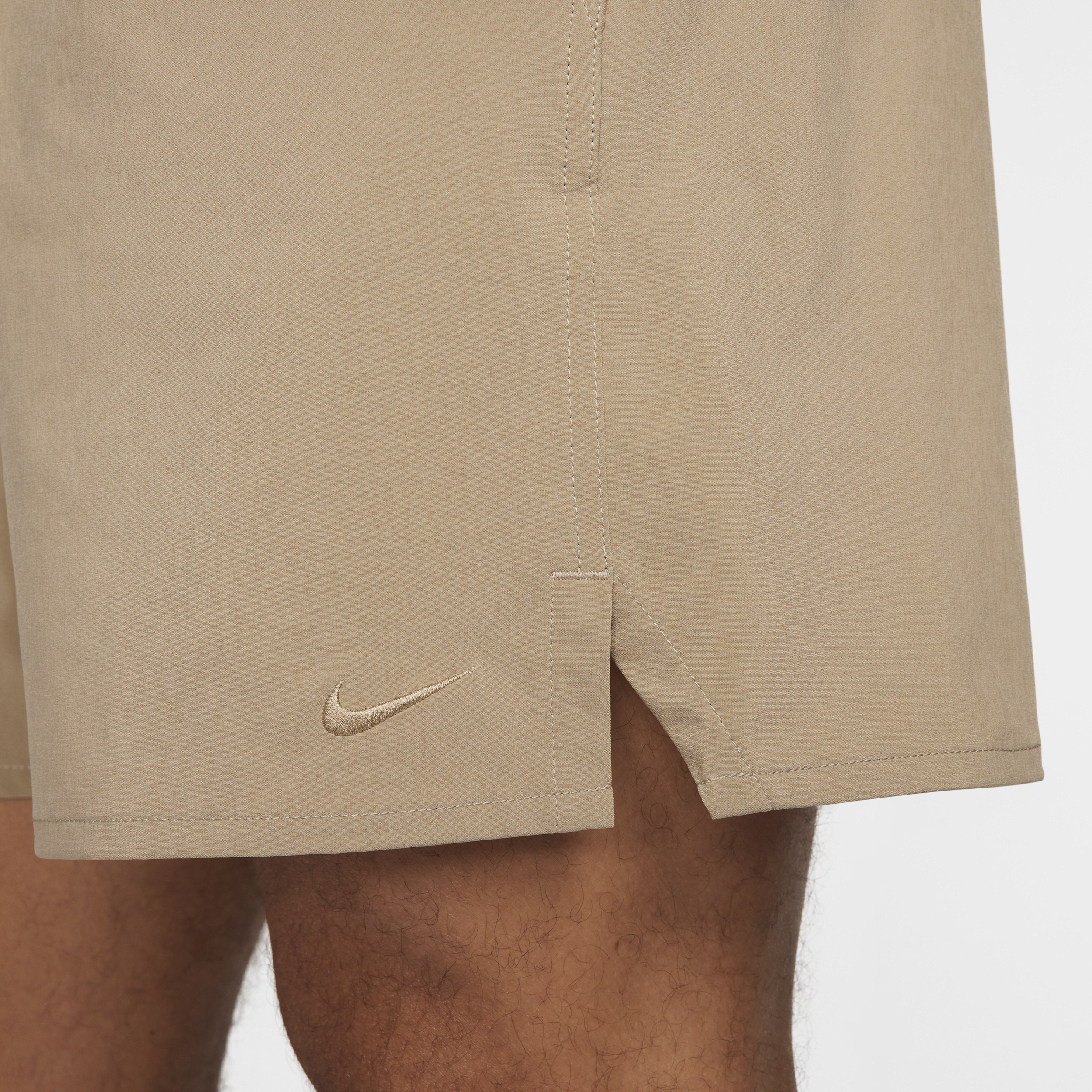 Nike Unlimited multifunctionele niet-gevoerde herenshorts met Dri-FIT (18 cm) Bruin