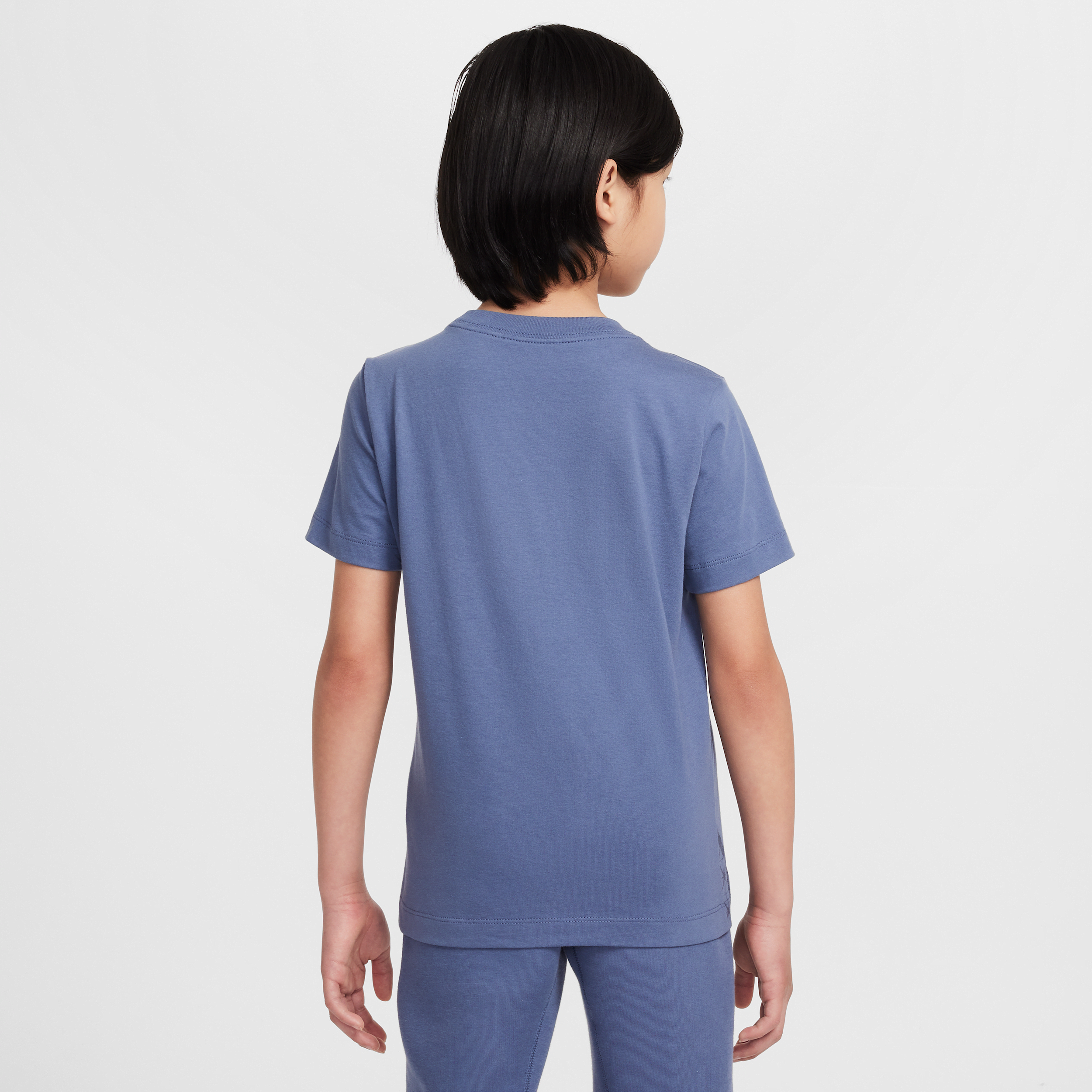 Thumbnail - Paris Saint-Germain Nike Fußball-T-Shirt mit saisonalem Print (ältere Kinder) - Blau