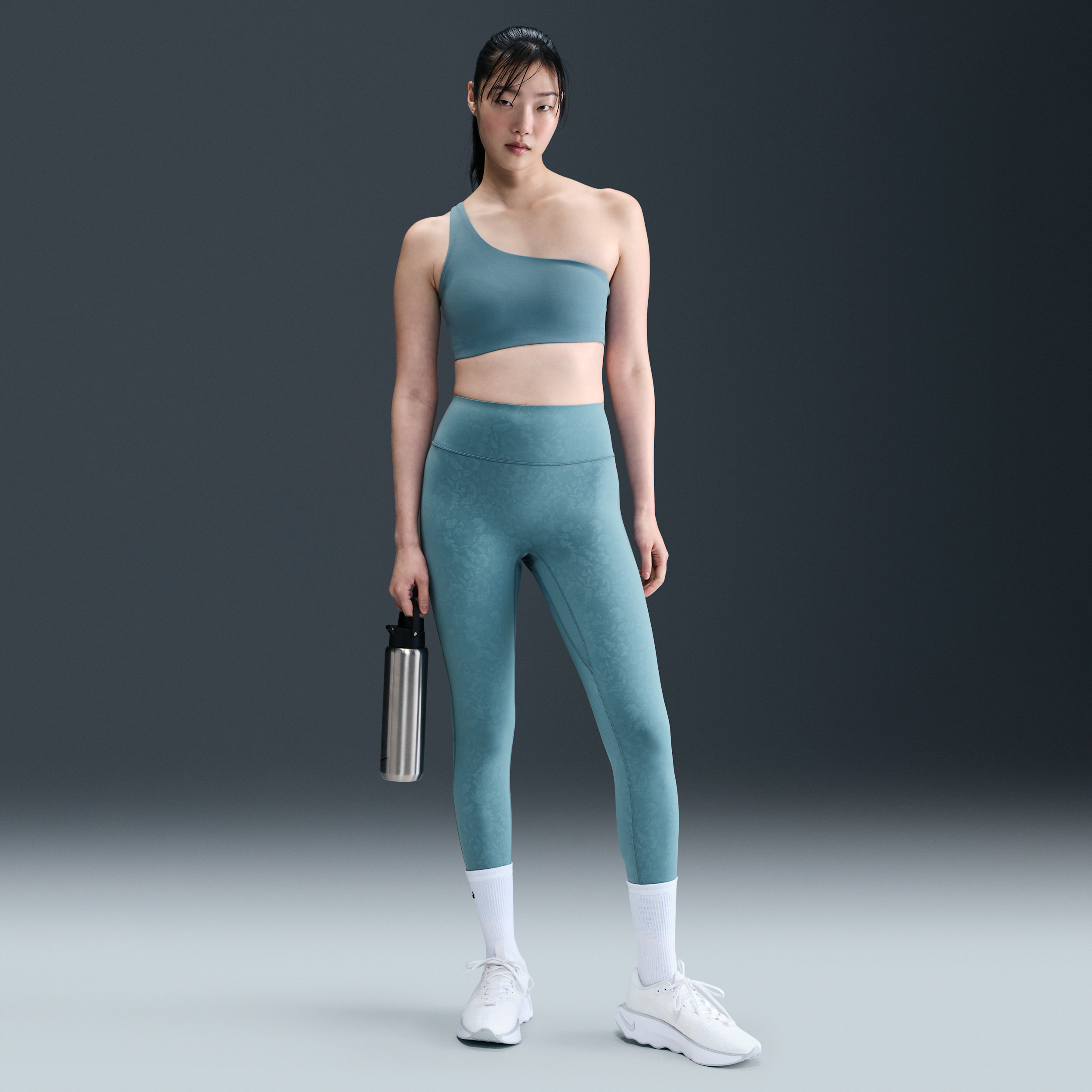Thumbnail - Nike Universa 7/8-Leggings mit floralem Design, mittlerem Halt und hohem Bund (Damen) - Blau