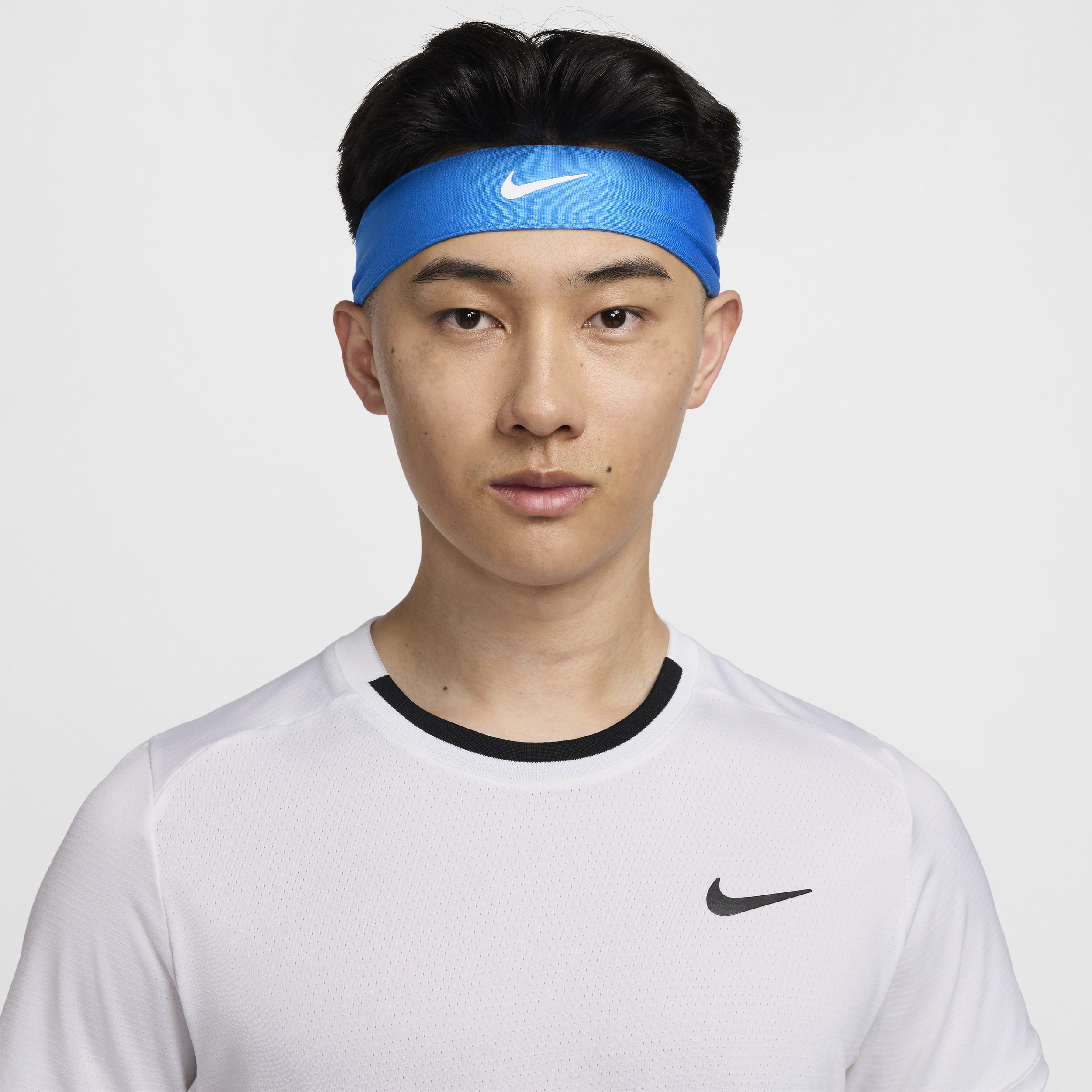 Nike Court Tennishoofdband voor dames Blauw
