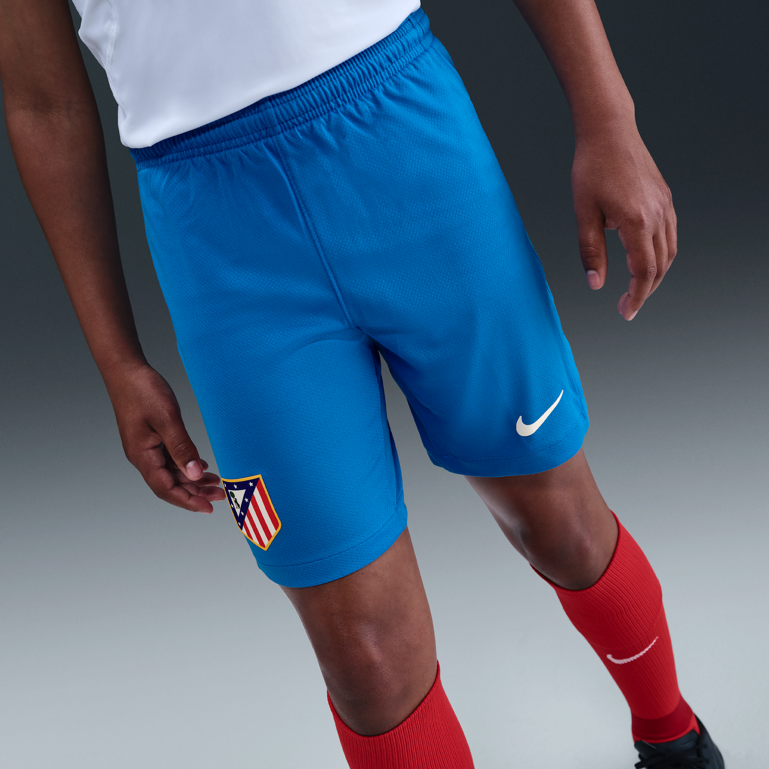 Thumbnail - Atlético Madrid 2025/26 Stadium Third Nike Dri-FIT Total 90 Replika-Fußballshorts (ältere Kinder) - Blau