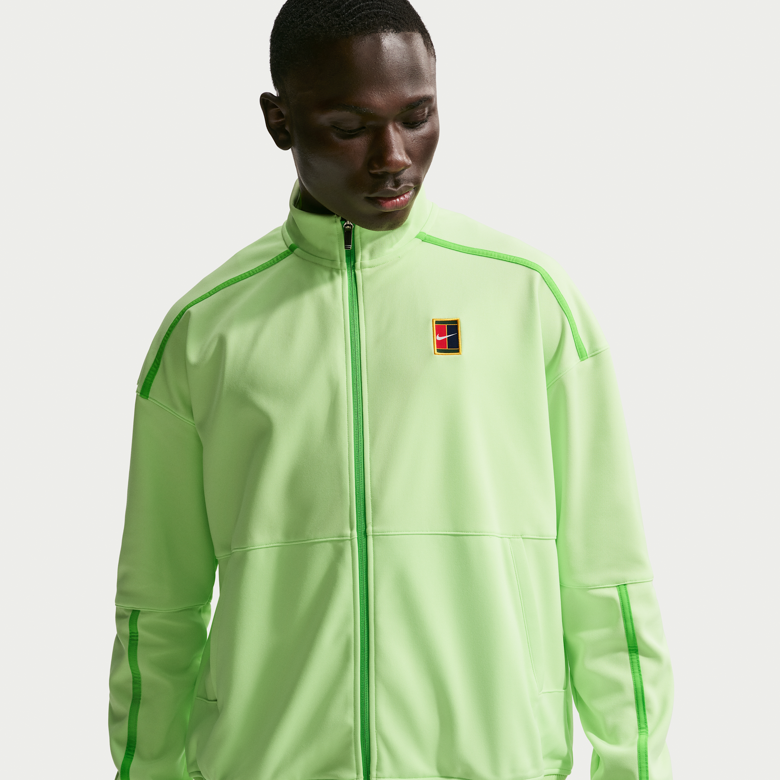 Giacca da tennis NikeCourt Heritage – Uomo - Verde