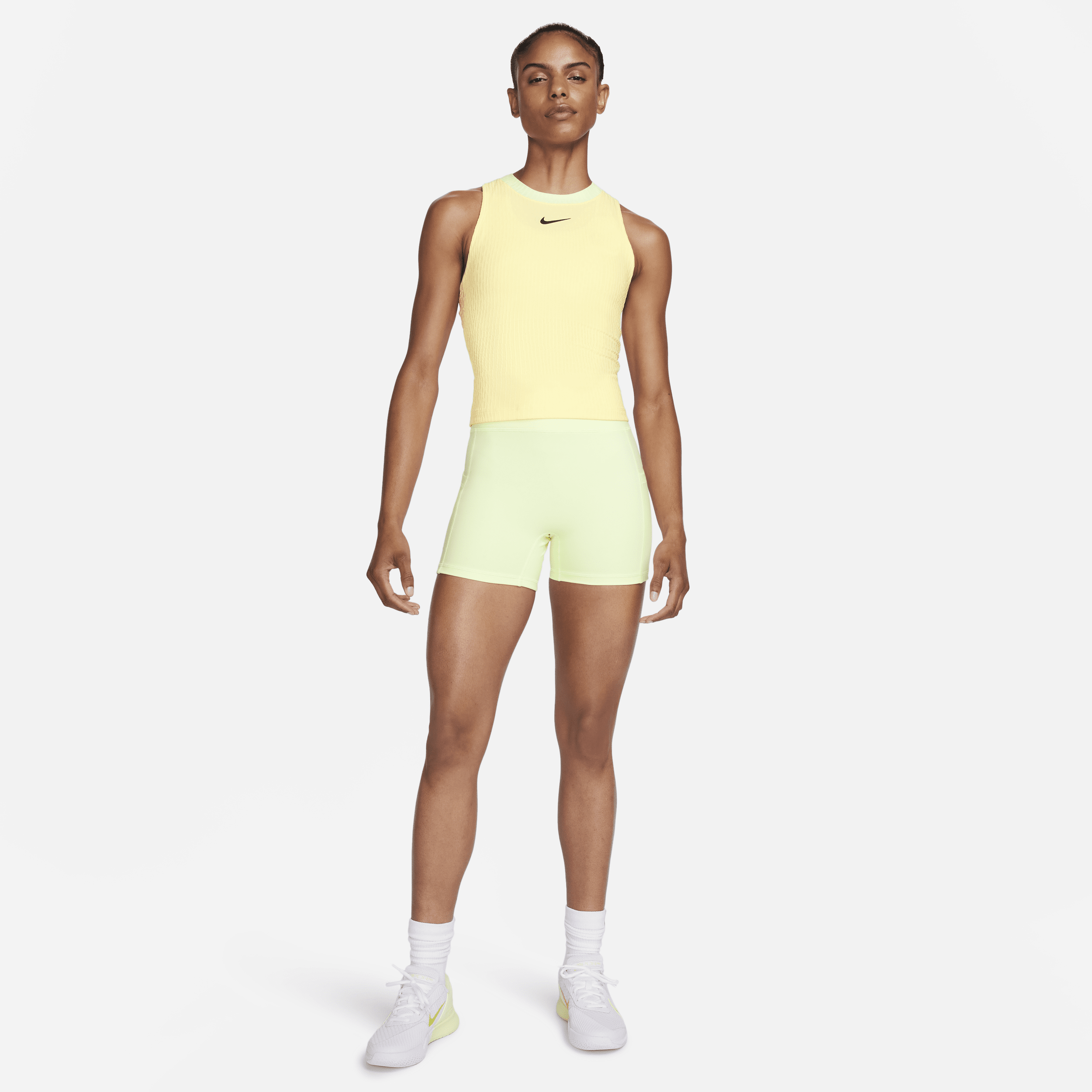 Nike Court Slam Dri-FIT tennistanktop voor dames Geel
