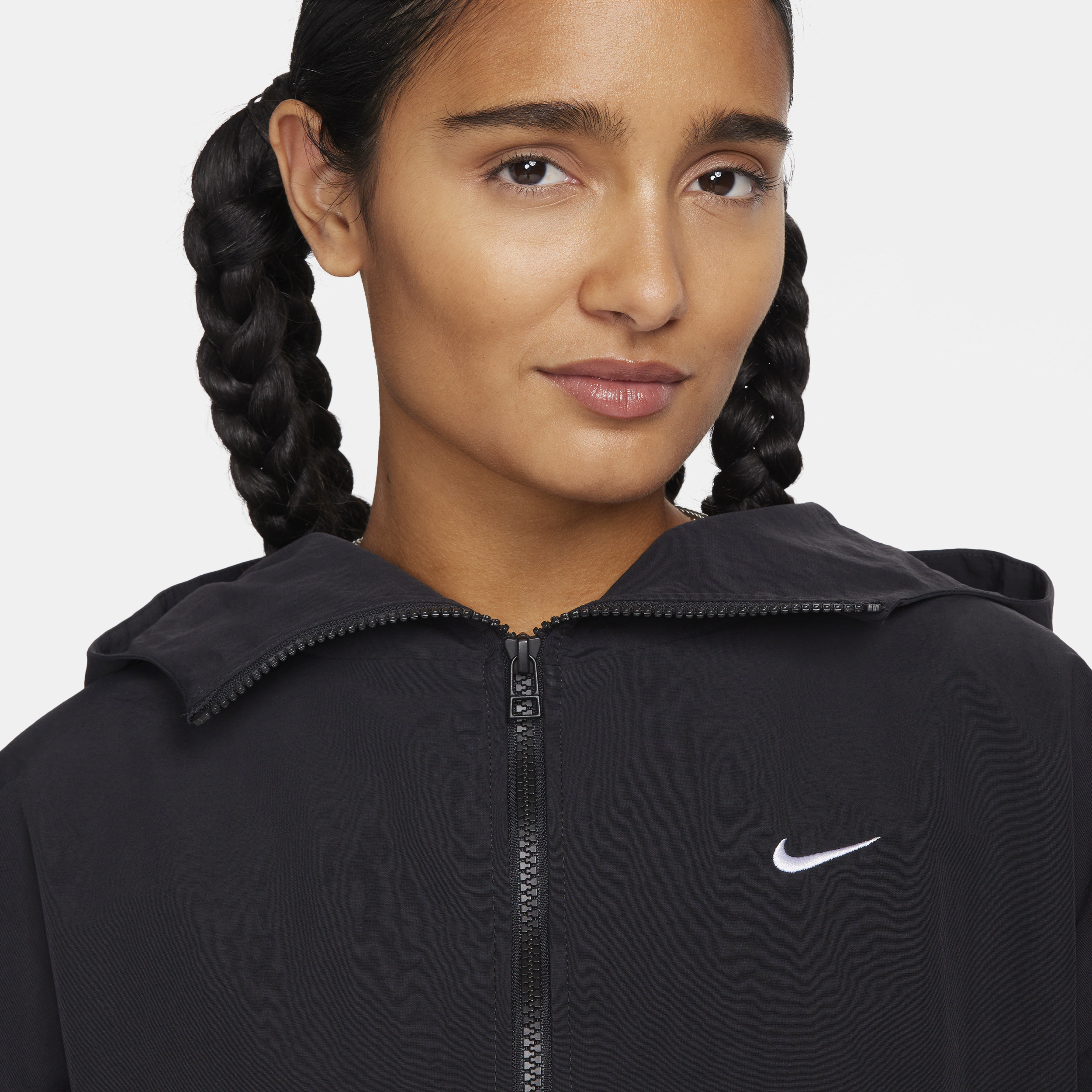 Nike Sportswear Everything Wovens oversized damesjack met capuchon Zwart