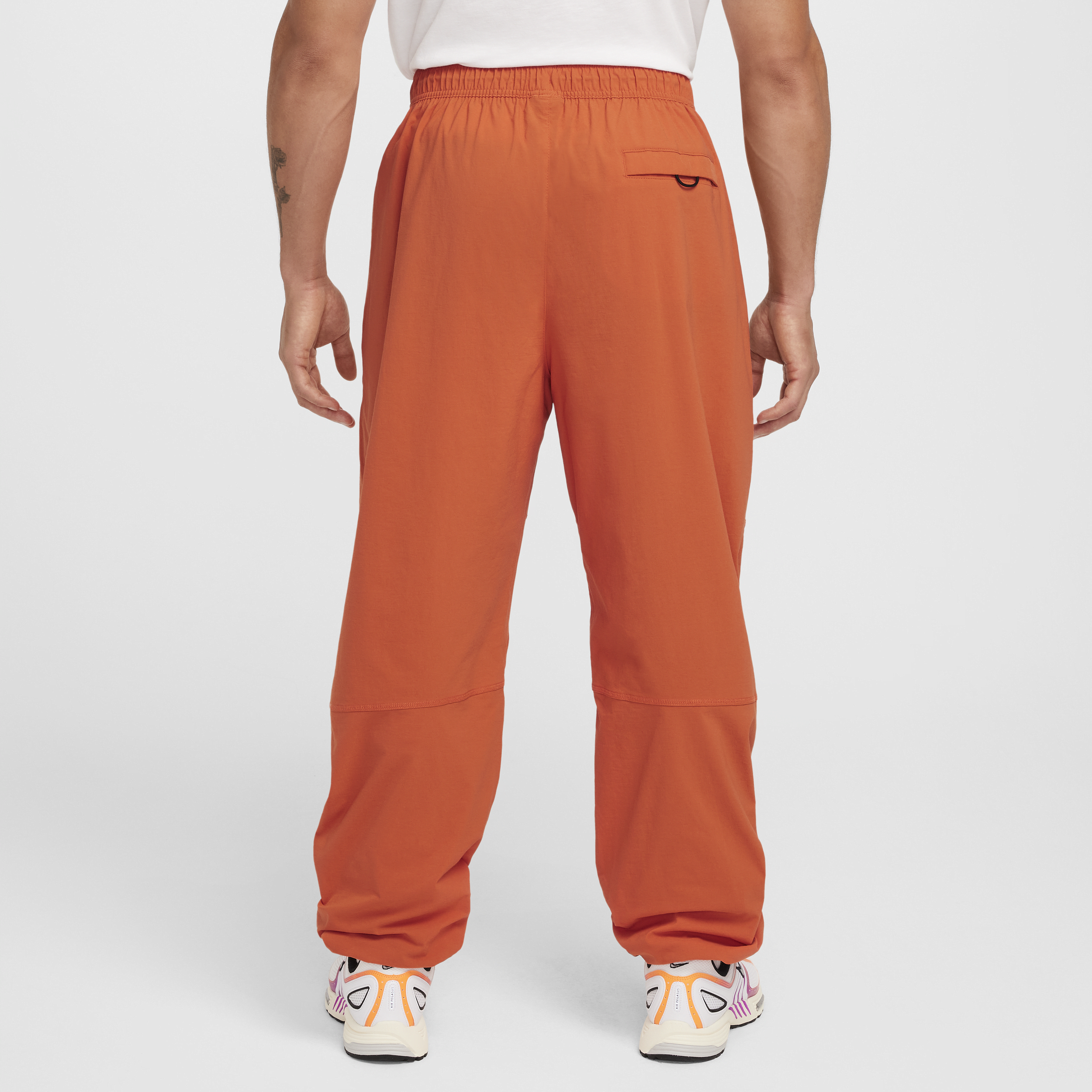 Pantalon oversize tissé Nike Tech pour homme - Orange