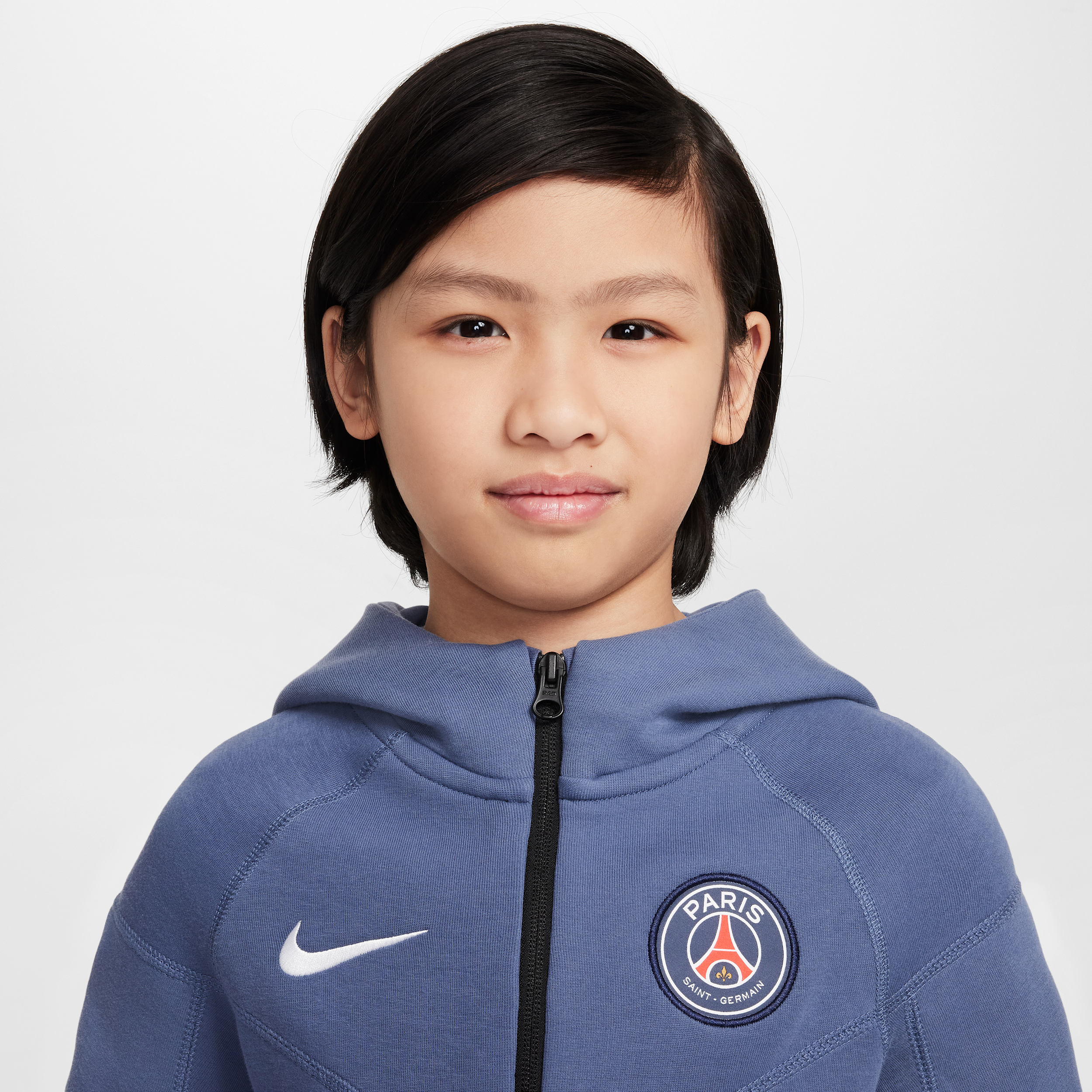Thumbnail - Paris Saint-Germain Tech Nike Fußball-Kapuzenjacke aus Fleece (ältere Kinder, Jungen) - Blau