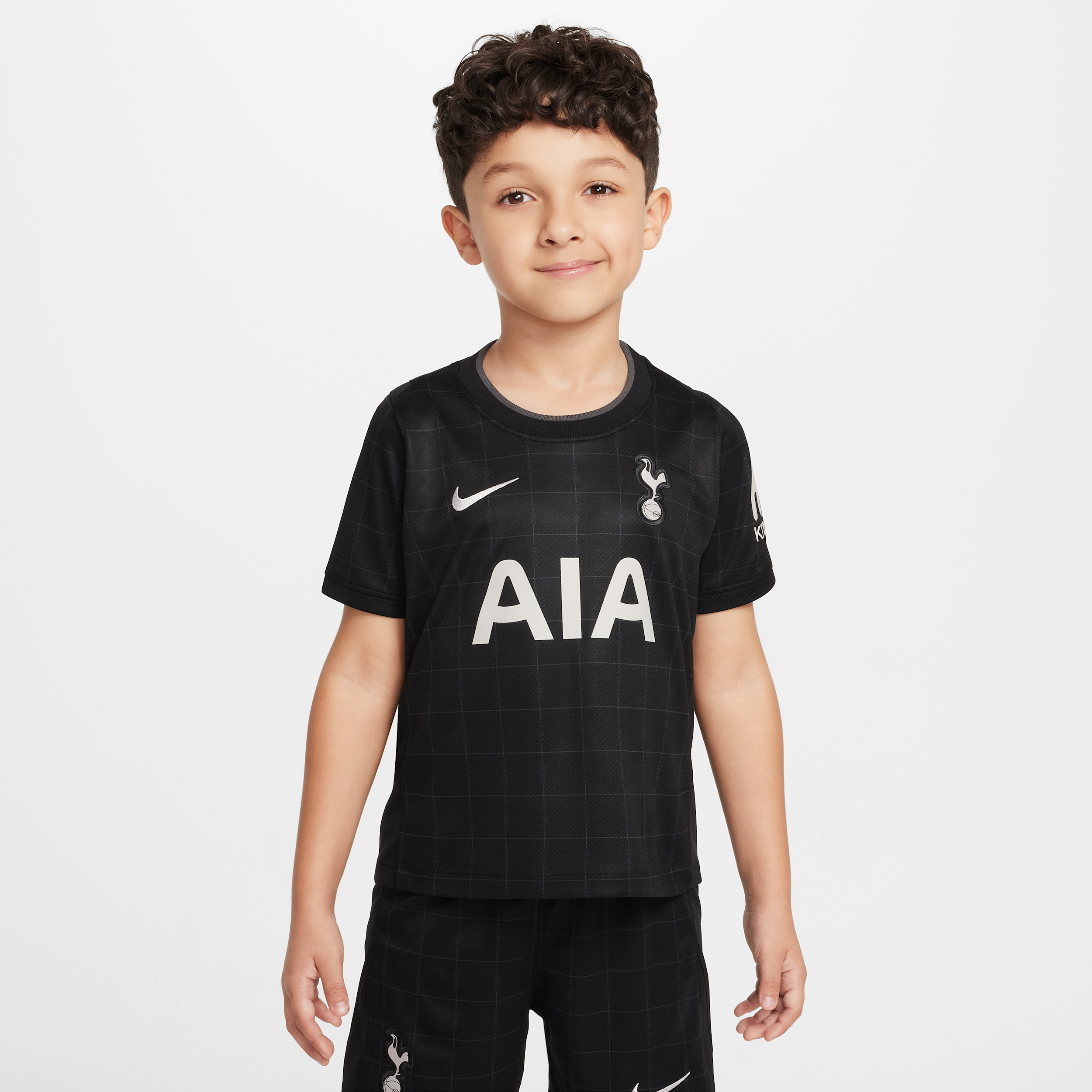 Thumbnail - Tottenham Hotspur 2025/26 Stadium Away dreiteiliges Nike Replika Fußballtrikot-Set (jüngere Kinder) - Schwarz