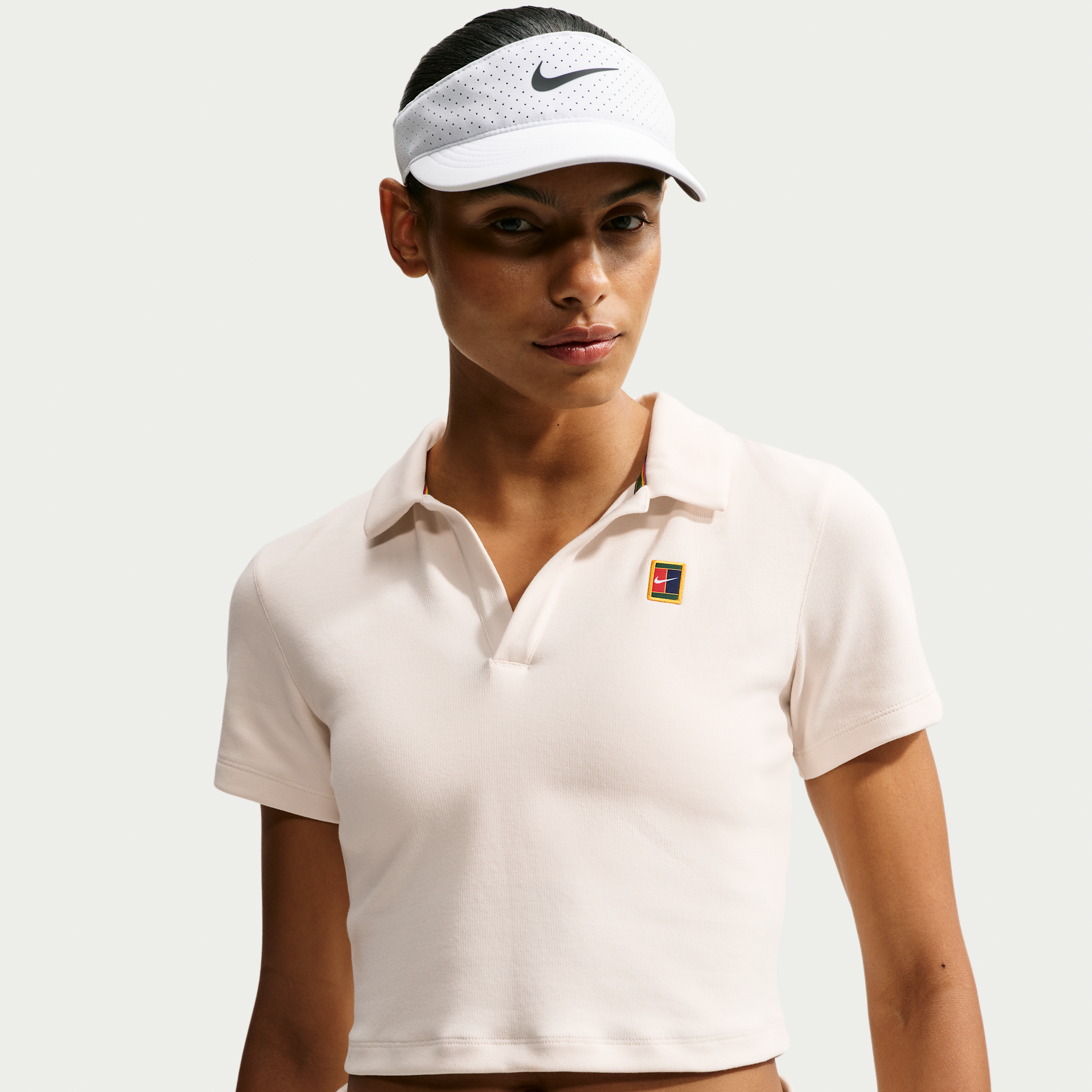 Cropped NikeCourt Heritage-tennispolo med korte ærmer til kvinder - hvid