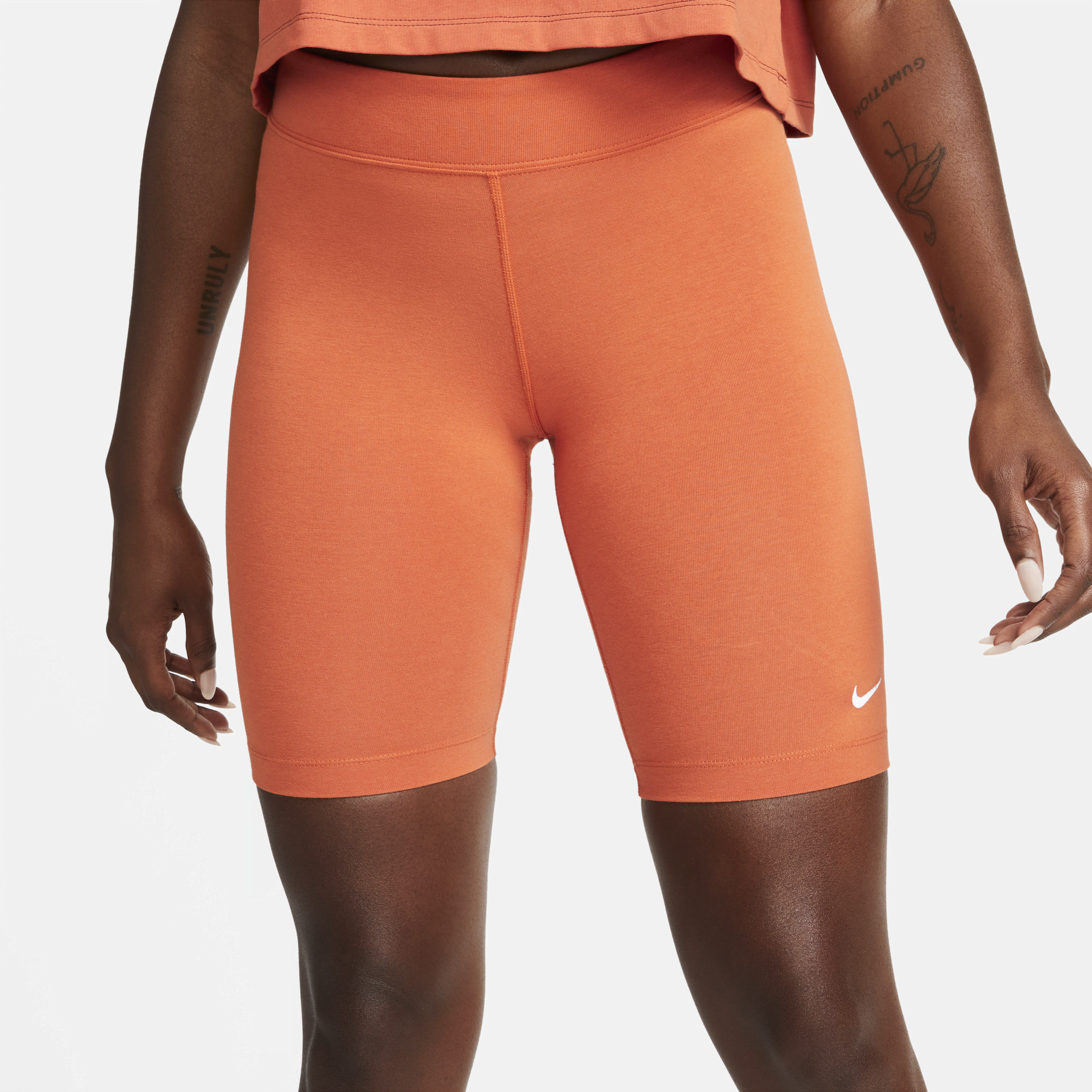 Damskie spodenki do jazdy na rowerze ze średnim stanem Nike Sportswear Essential - Pomarańczowy