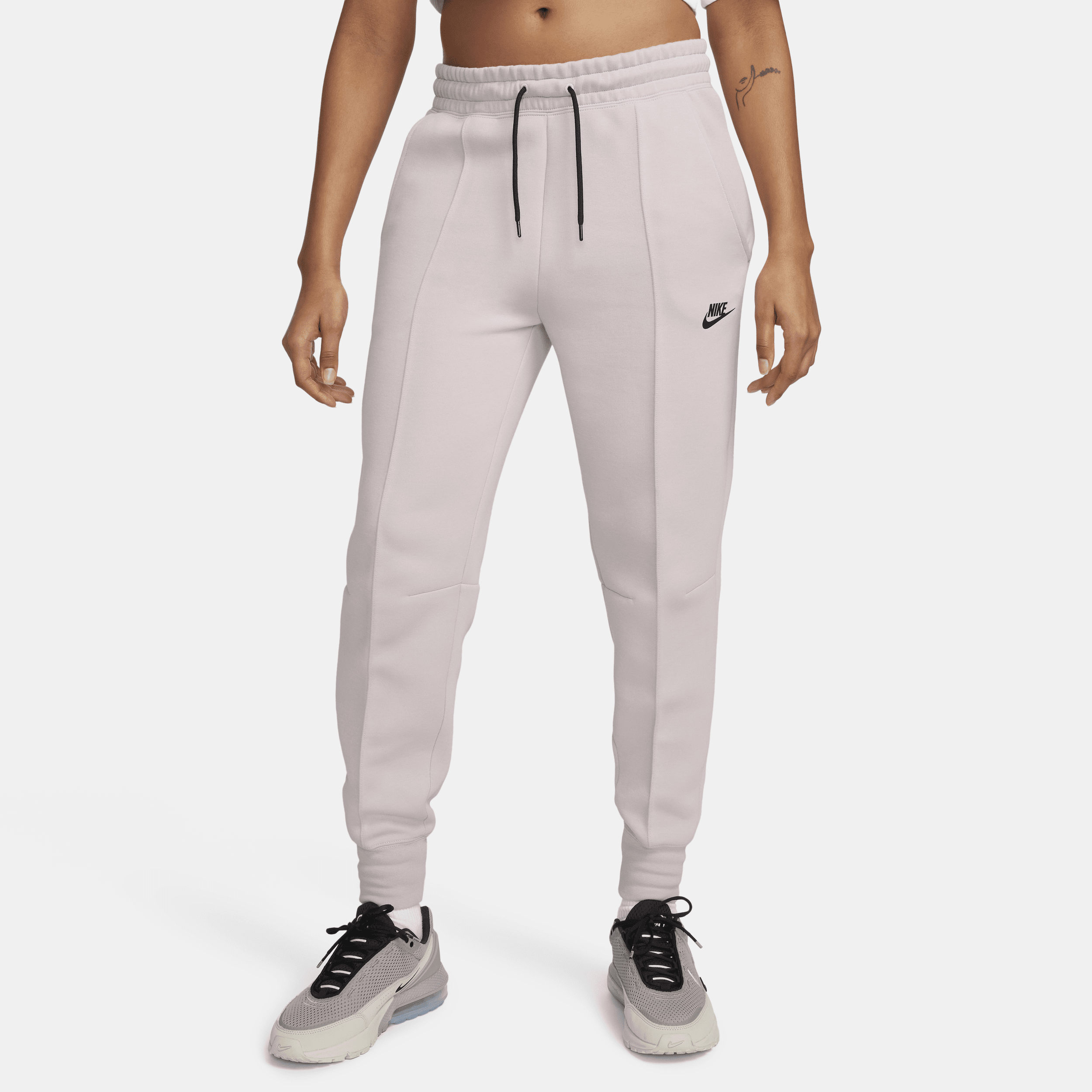 Nike Sportswear Tech Fleece Joggingbroek met halfhoge taille voor dames Paars