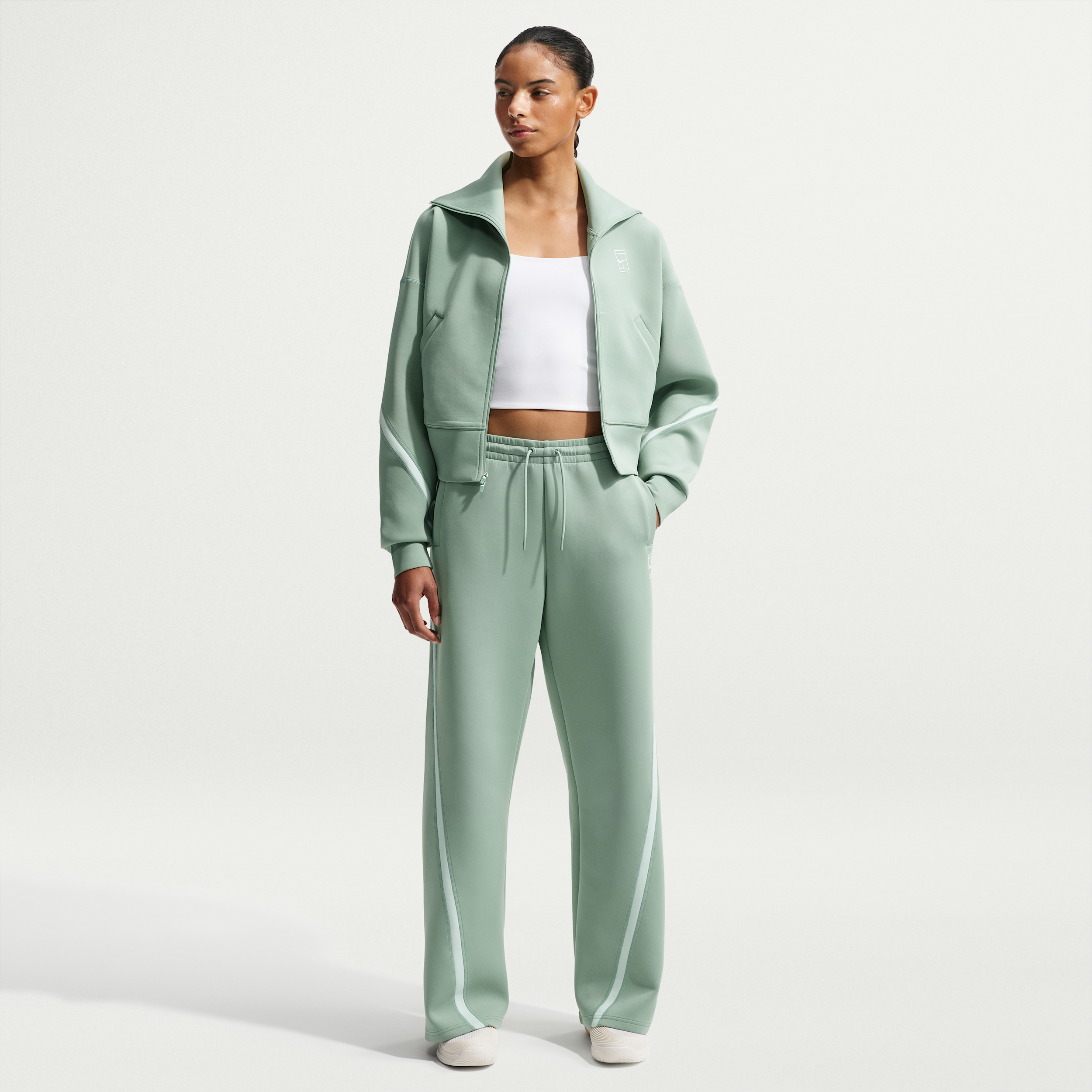 Pantaloni da tennis a vita media Dri-FIT Nike Advantage – Donna - Verde